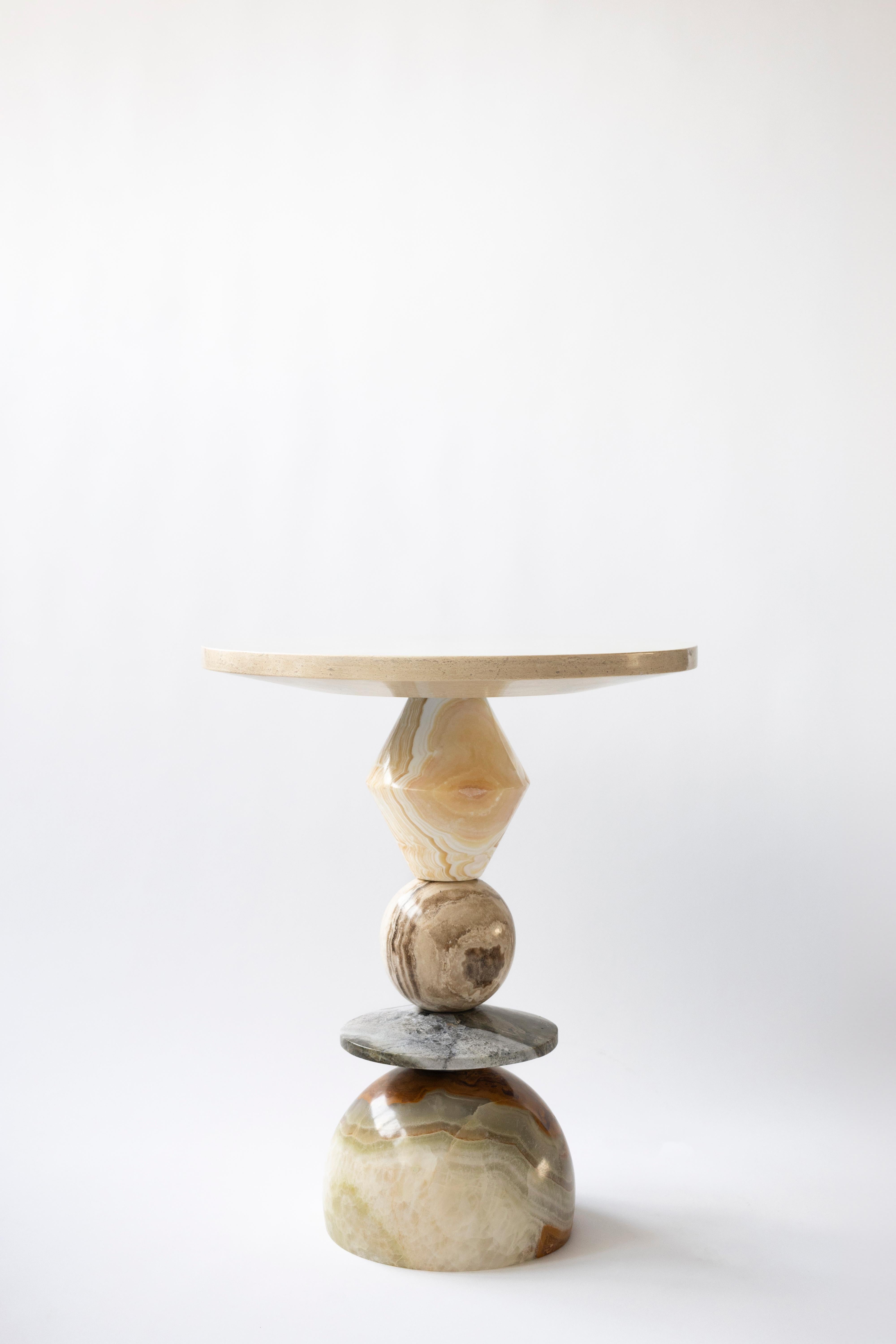Materials: Green onyx, blue sky marble, brown onyx, pineapple onyx, travertine
Indoors
Hand crafted Side table

Inspired by the enduring legacy of observing the cosmos, 'Cosmic Traces' evolves from the essence of 'Cosmic Relics.' While totems