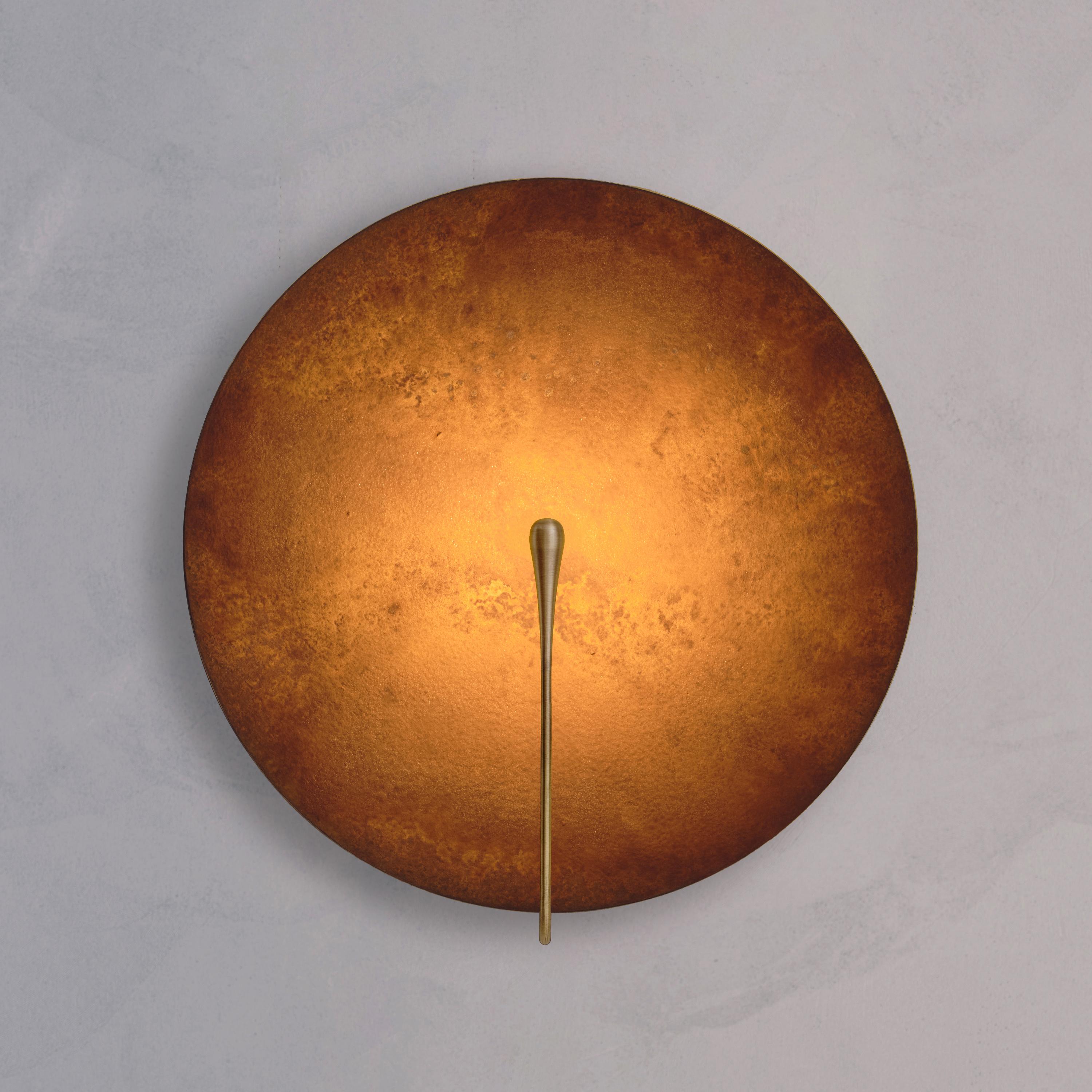 Inspired by the beautiful textures of nature, a 'Rust' patina is applied onto the hand-spun brass plate to create this unique finish. Please note that each piece is individually handmade, therefore unique in its own way.
 
Softly illuminated with