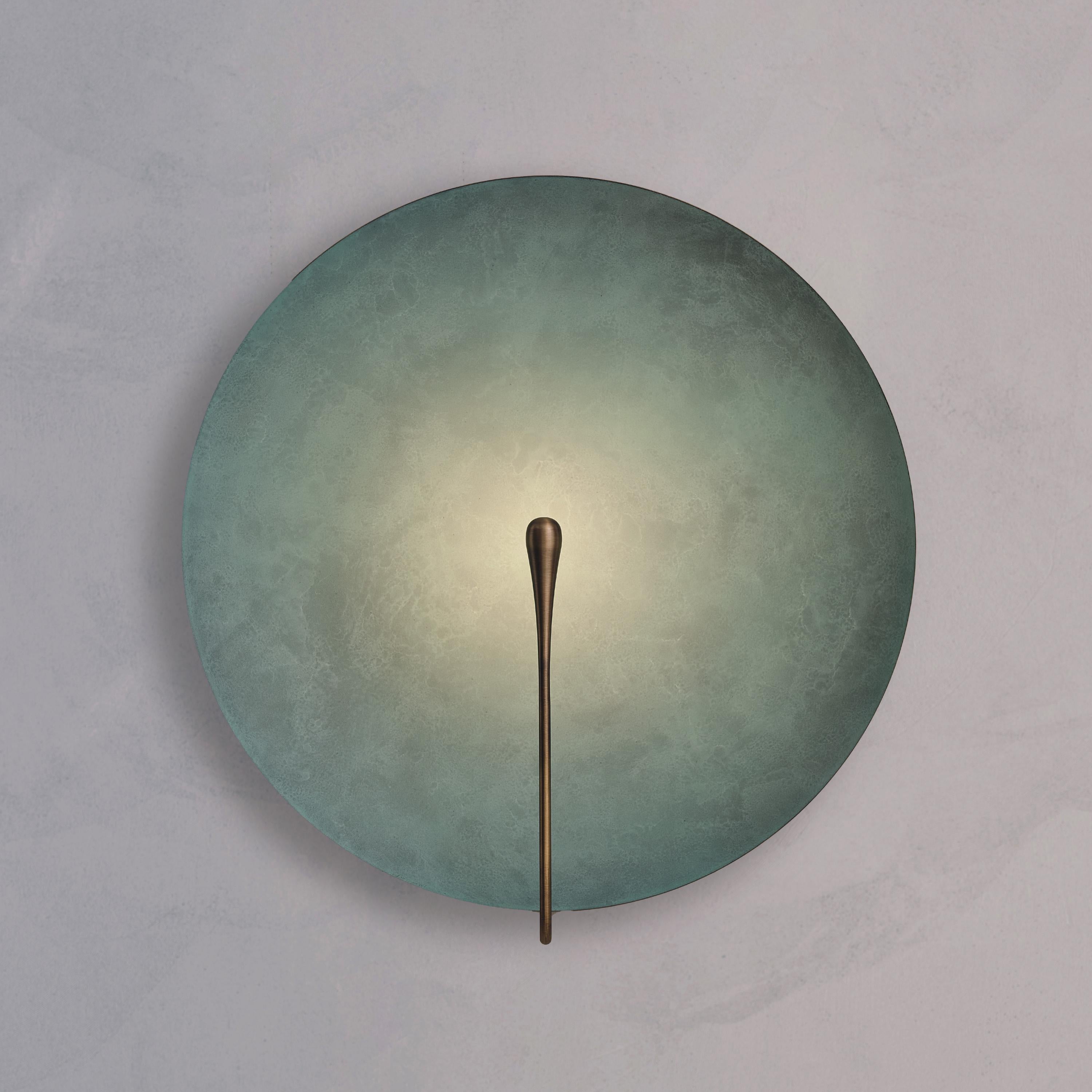 Inspired by the beautiful textures of nature, a 'Verdigris' patina is applied on a hand-spun brass plate to create this unique finish. Please note that each piece is individually handmade, therefore unique in its own way.
 
Softly illuminated with
