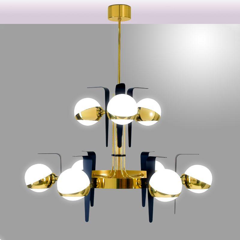 Part of the iconic Cosmica series of splendid lighting fixtures, this two-level chandelier embodies a stylish combination of clean geometric lines, exquisitely put together in a futuristic composition. Handcrafted of gold-finished brass, it is
