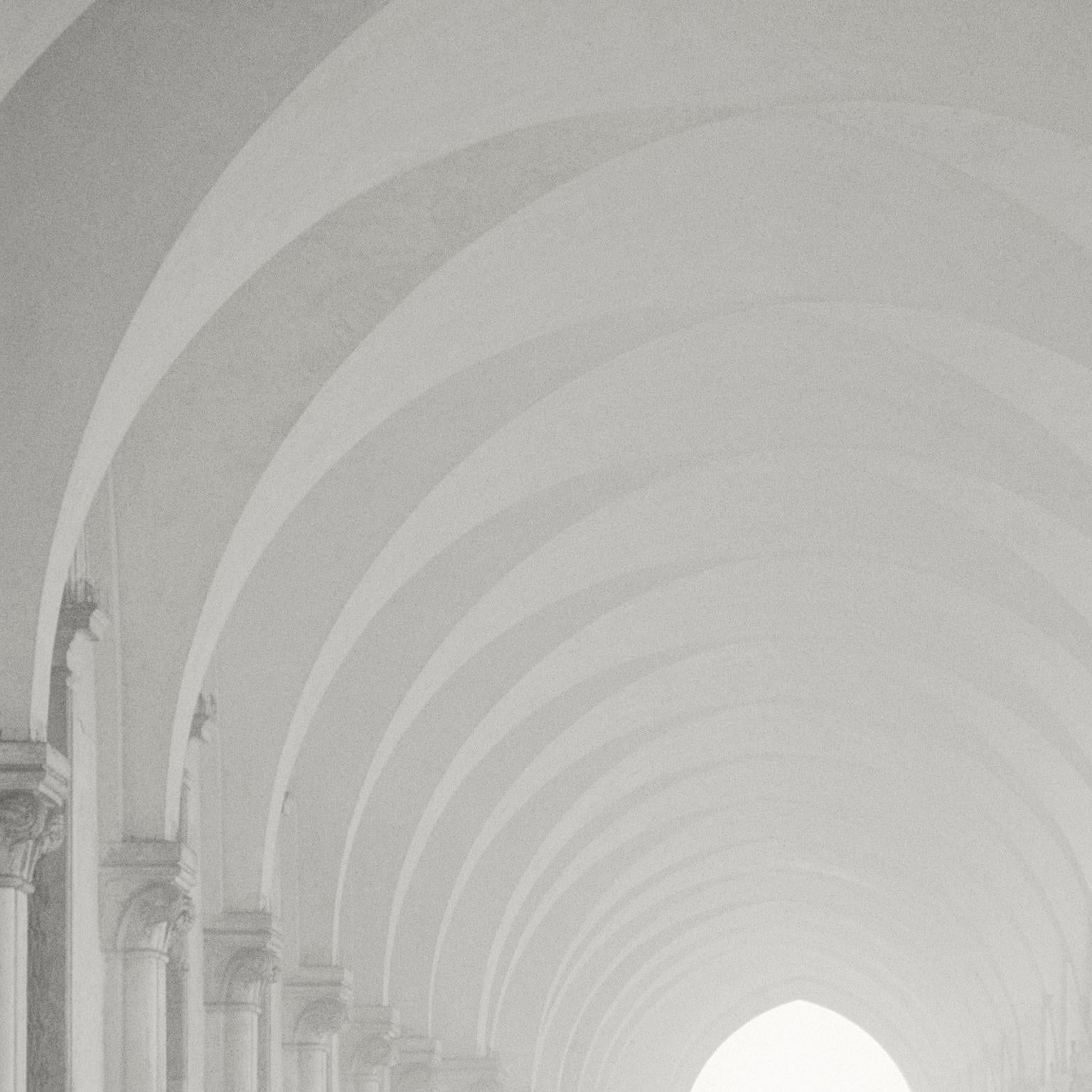 Columns and arches in misty fog, black and white.  Doges Palace, Venice, Italy 2 - Photograph by  Cosmo Condina