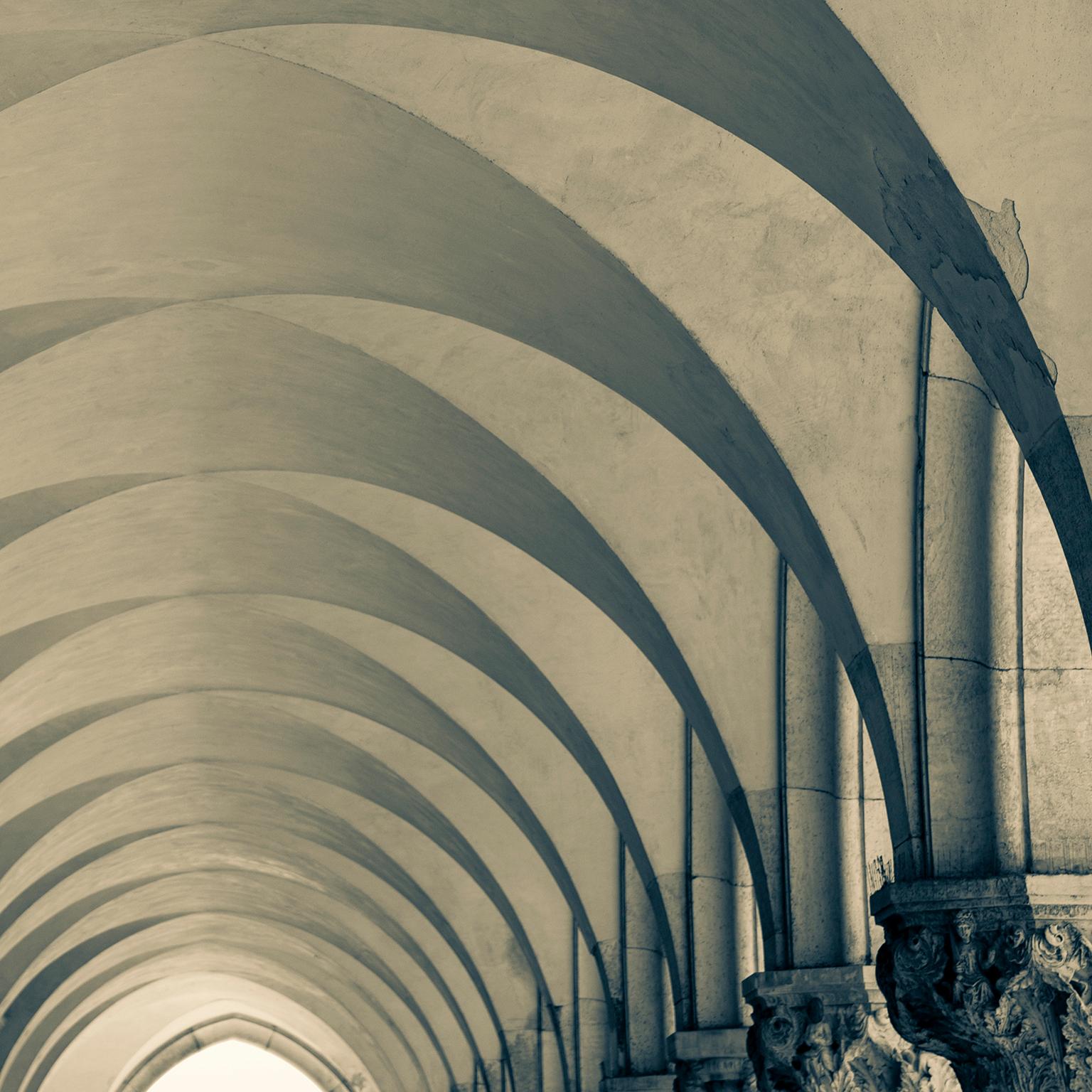 Doges Palace Colonnade, Venice, Italy 2018
Photograph by Cosmo Condina. Arched vaulted ceiling.
Archival pigment print 19 X 12.6 in. Edition of 10. This is # 3/10 in the edition.

Detail of Venetian Gothic architecture of the colonnade at the Doges