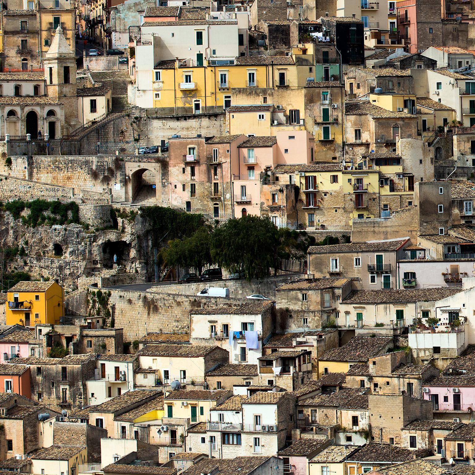 Italy, Sicily, View of the town of Ragusa, 2017

Photograph by Cosmo Condina of Ragusa, one of the most picturesque charming historic hilltop town in Sicily. One of the UNESCO-listed Baroque towns of south-east Sicily.

Archival Pigment Print, 19” X