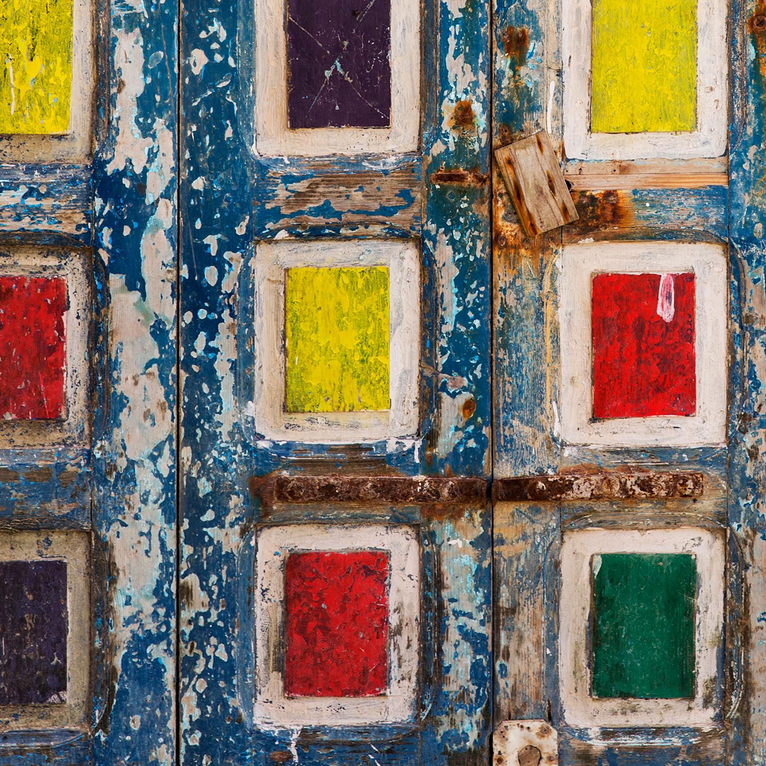 Painted Door, Morocco, 2016
Photograph by Cosmo Condina. A painted door in Essaouira, Morocco, 2016

Archival pigment print 19 X 12.6 in. Edition of 10. This is # 3/10 in the edition.

Colour photograph of a weathered doorway, peeling paint and