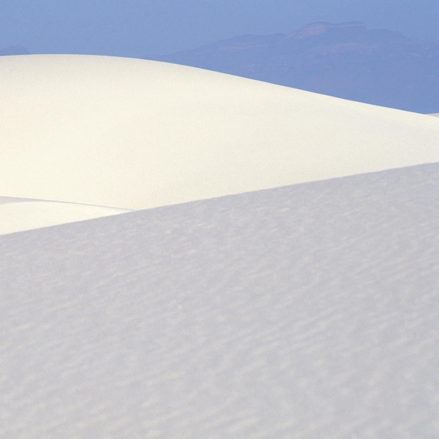 White Sands National Park, USA, 2004, Vers. 1 -  Like no place on earth, powder white sand dunes, 
Photograph by Cosmo Condina. Sand dunes as abstracts. 
Archival pigment print 19 X 12.3 in. Edition of 10. This is # 3/10 in the edition.

Rising from