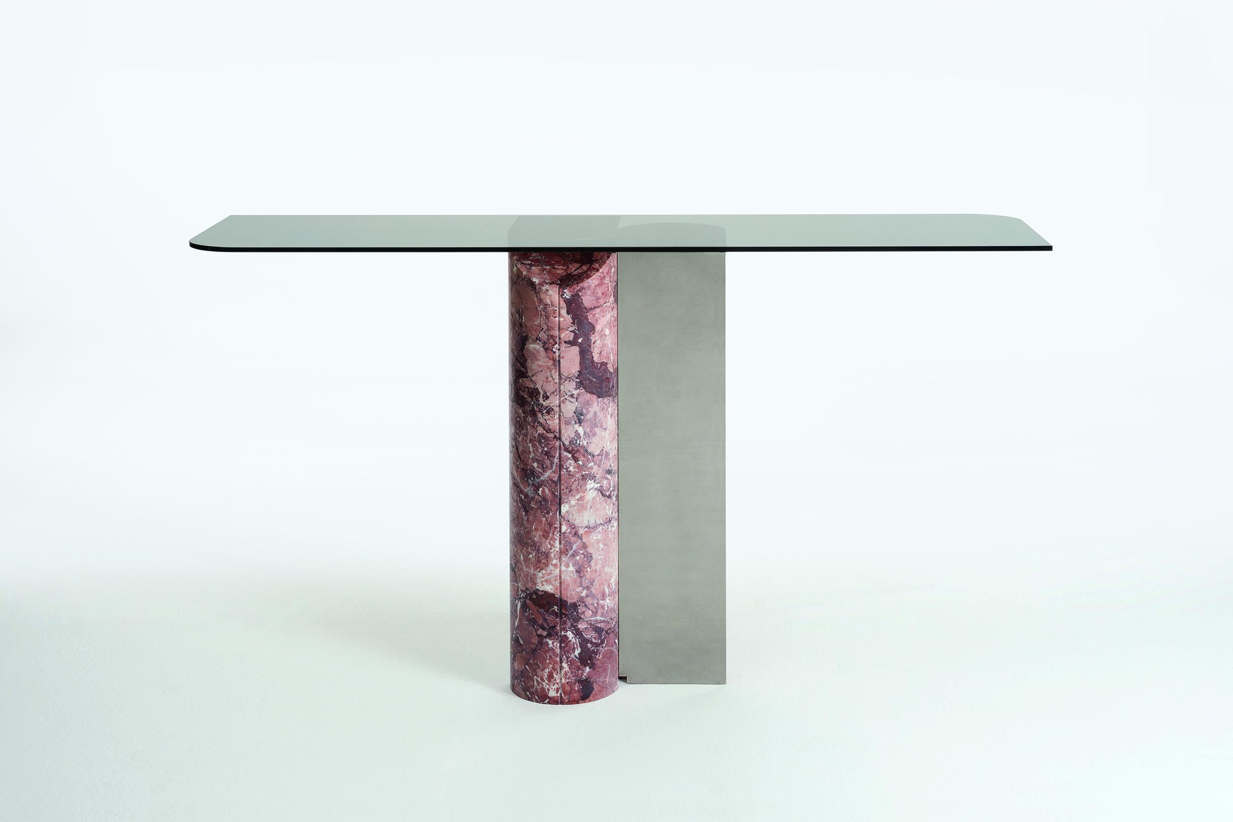 Cosmo Console by Andrea Bonini
Limited Edition
Dimensions: D 40 x W 150 x H 90 cm.
Materials: Steel, fumè glass and Rosso Francia marble.

Made in Italy. Limited series, numbered and signed pieces. Custom size or finish on request. Also available in