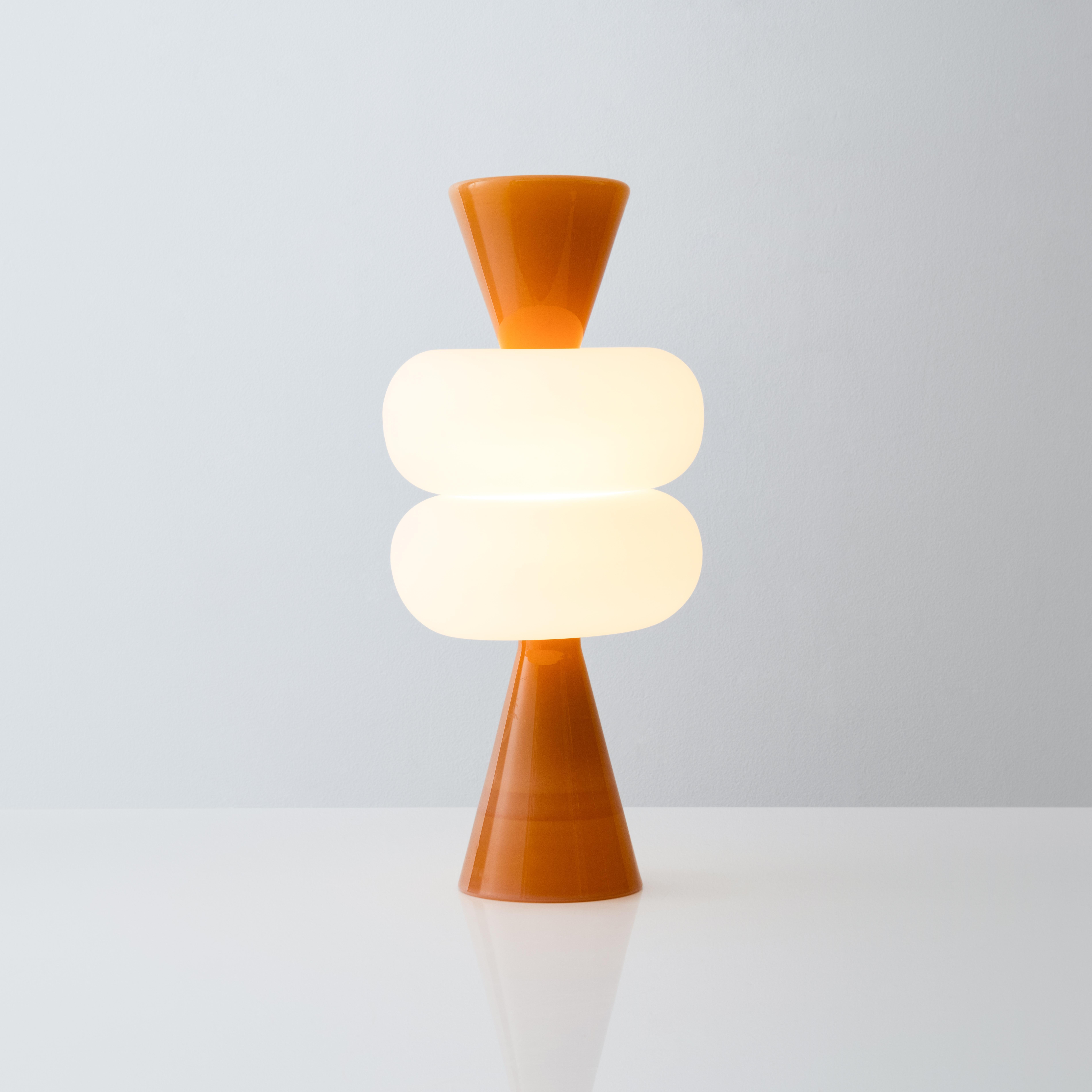 Cosmos 03 Table Lamp by Noiro Studio
Dimensions: D 25 x H 50 cm.
Materials: Glass.

Handcrafted in New York City using the finest glass-blowing techniques, our Cosmos collection is a truly unique piece of art. Inspired by the captivating torus