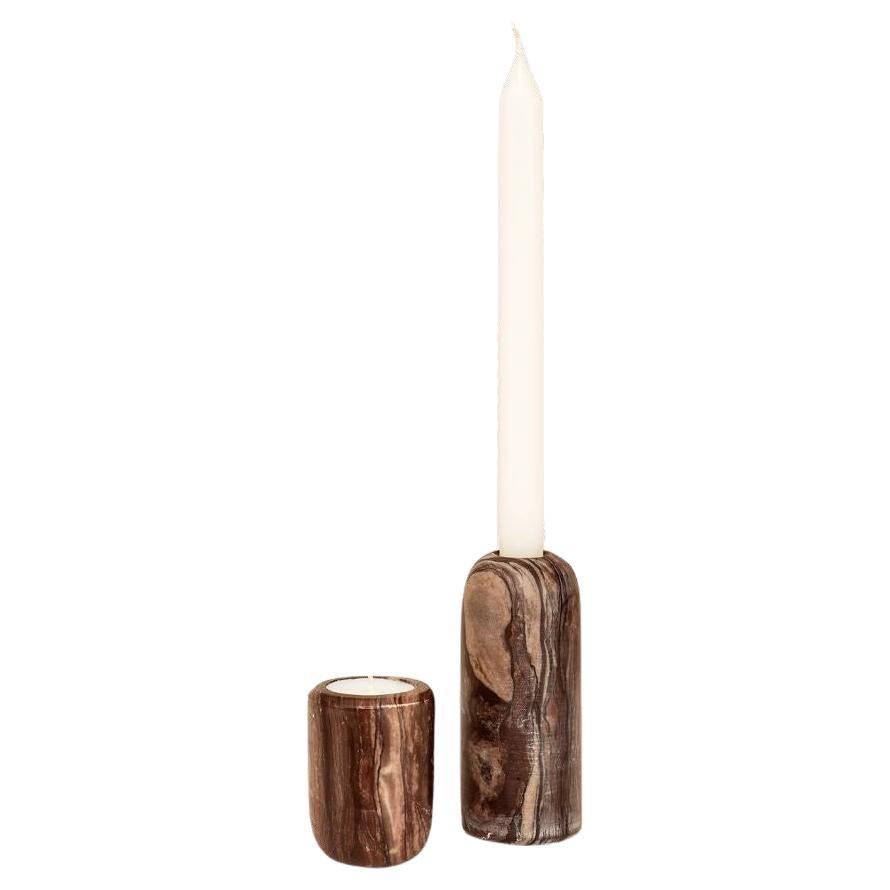 The Candle holders are perfect accessories to add to ambient lighting. They come in 2 sizes and a variation of Indian marbles including a dusty rose and a striking graphic monochrome. It pays tribute to the ancient Indian Ling symbol, a tower or egg