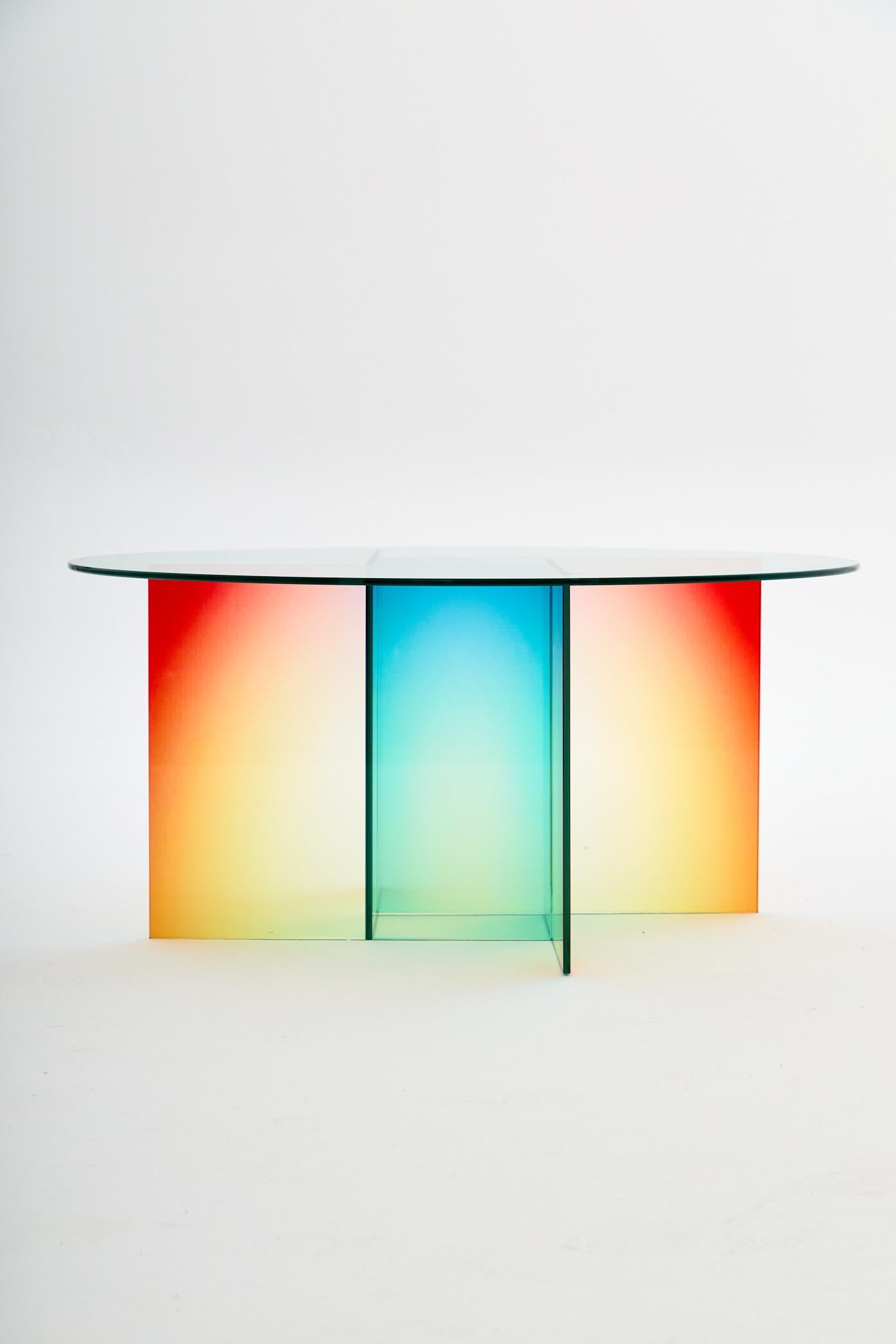 Cosmos Coffee Table by Studio Monsoleil
Dimensions: Ø 90 x H 45 cm.
Materials: Laminated glass.

The Cosmos table series is created by combining glasses with gradient color transitions with a special bonding technique. Coffee tables are located in