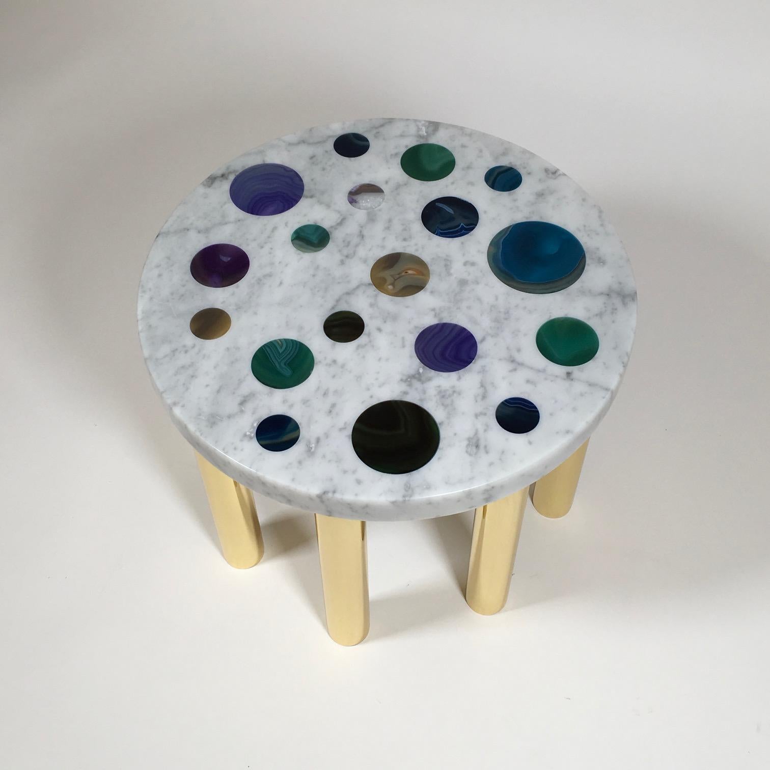 'Cosmos' coffee table in Carrara marble with agate disks of different colors and with 8 brass legs designed and produced by Studio Superego in 2018.

Superego Editions was born in 2006, performing a constant activity of research in decorative arts