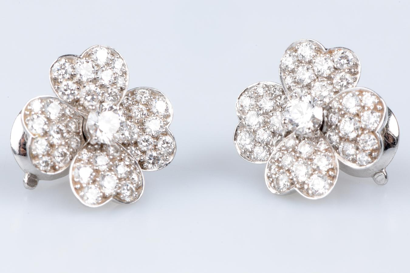 Evoking the grace and sophistication of 1950s jewelry, Van Cleef & Arpels earrings are a treasure trove of 21st-century jewelry art. Created in the 2000s, these sumptuous earrings in the shape of a four-leaf clover embody the timeless heritage of