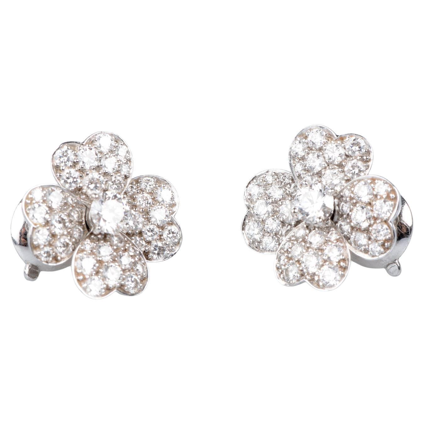 "Cosmos" earrings by Van Cleef & Arpels in gold and diamonds For Sale