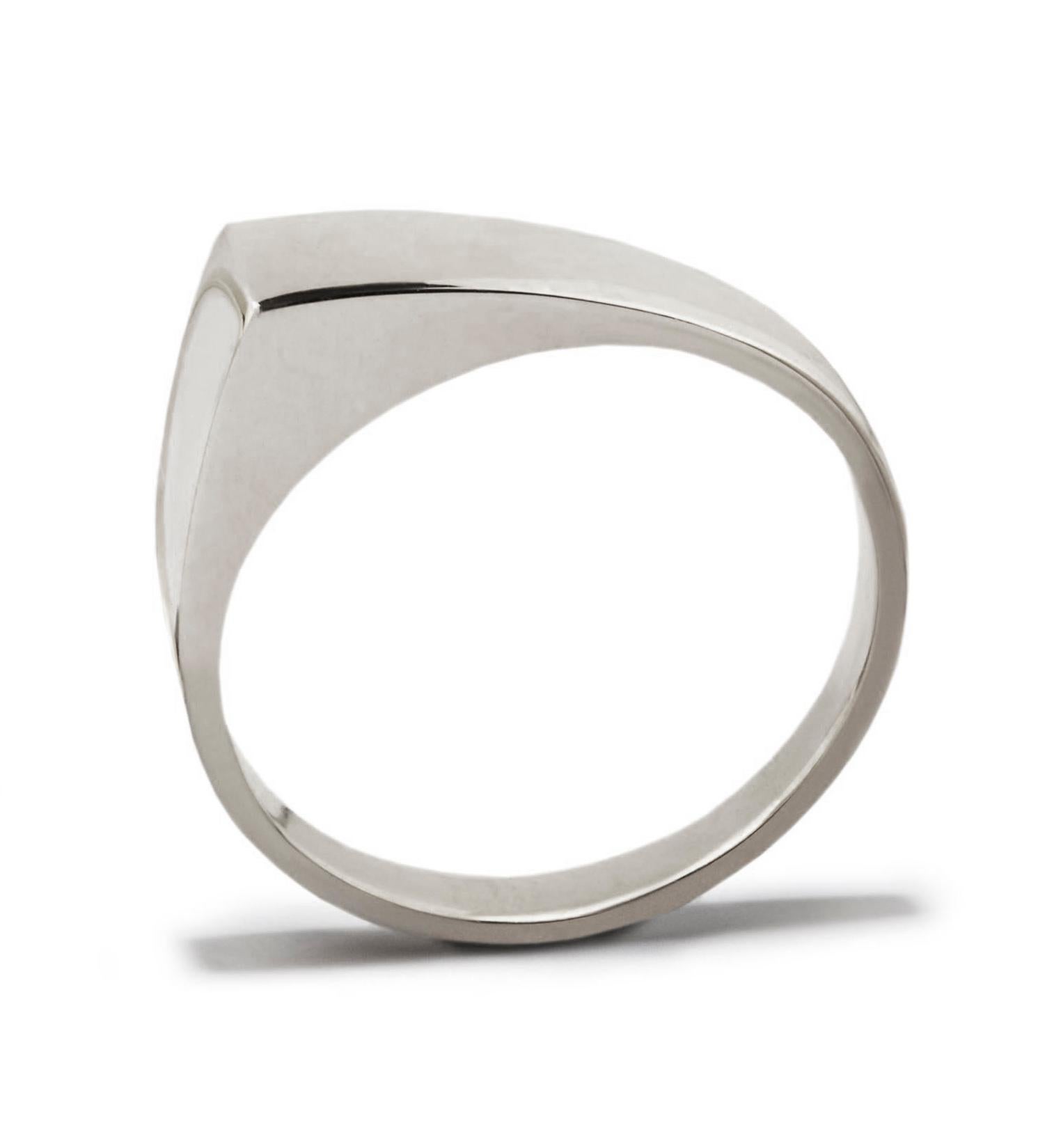 This simple style is an edgy take on the stacking ring.  Crafted in solid sterling silver, it is polished to a high shine with rounded edges for comfort.  In stock in UK size L (equivalent to US size 5 1/2 or European size 51 3/4 ). Also available