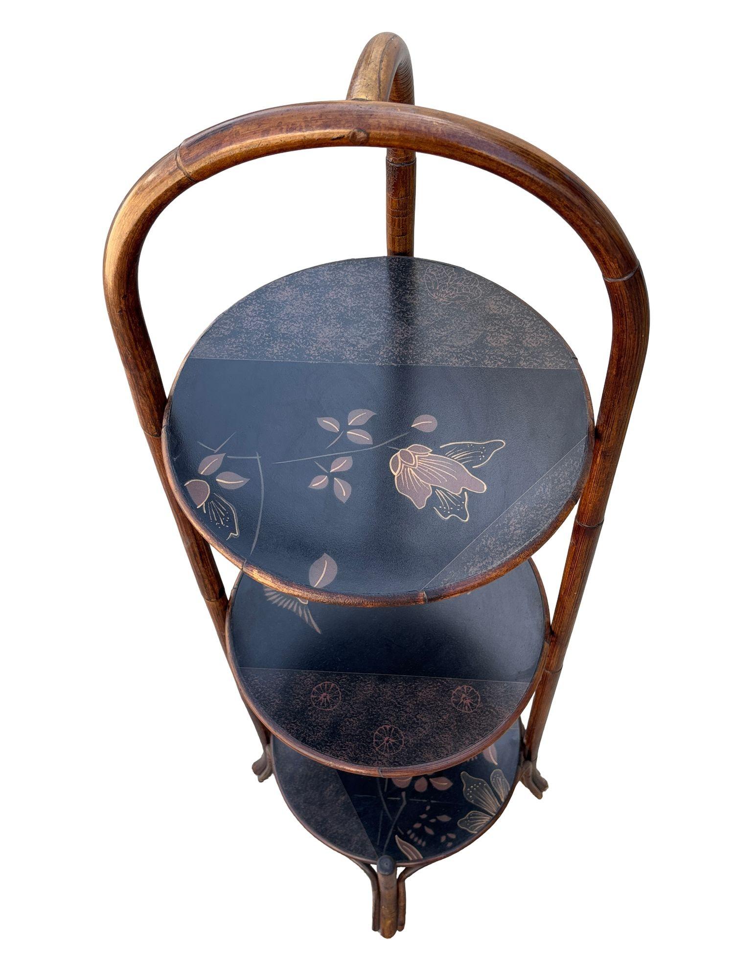 Costal Three Tiered Dark Stained Rattan Shelf w East Asian Motif Tops Bohemio en venta