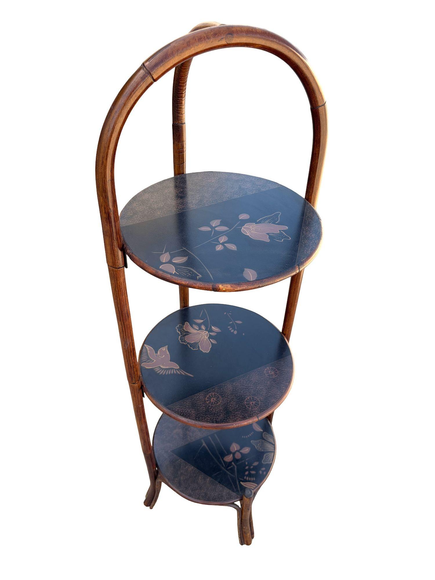 Costal Three Tiered Dark Stained Rattan Shelf w East Asian Motif Tops Ratán en venta
