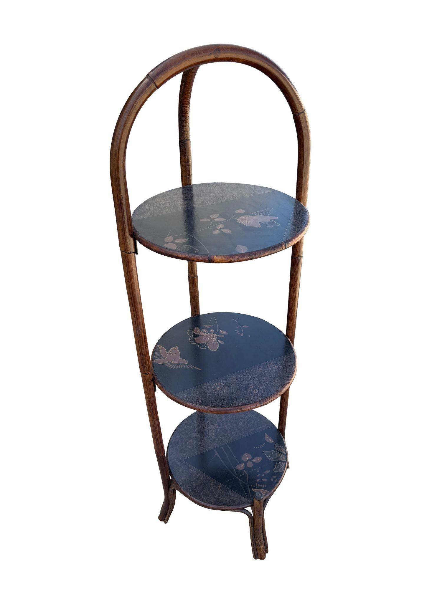 Costal Three Tiered Dark Stained Rattan Shelf w East Asian Motif Tops en venta 1
