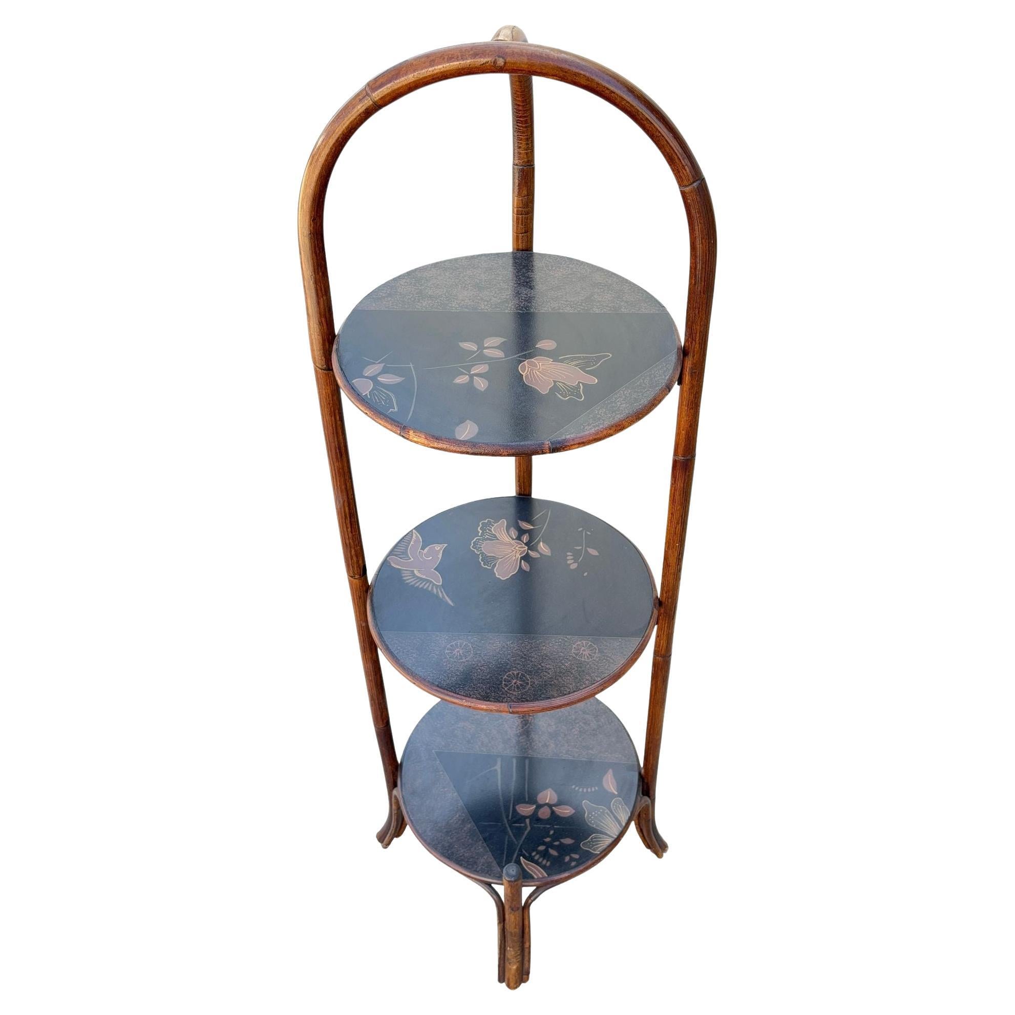 Costal Three Tiered Dark Stained Rattan Shelf w East Asian Motif Tops en venta