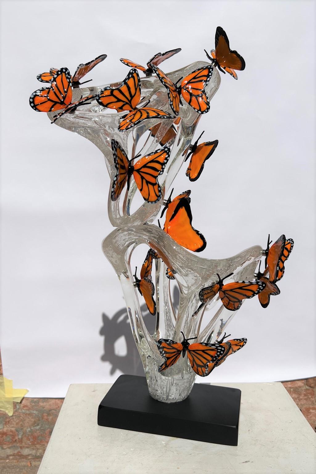 Handmade Crystal Pulegoso Murano Glass Sculpture Infinity with 21 Monarch butterflies attached with magnet. 
Modern sculpture ideal for a modern and rustic classic environment, for everyone. This work was carried out in collaboration between the