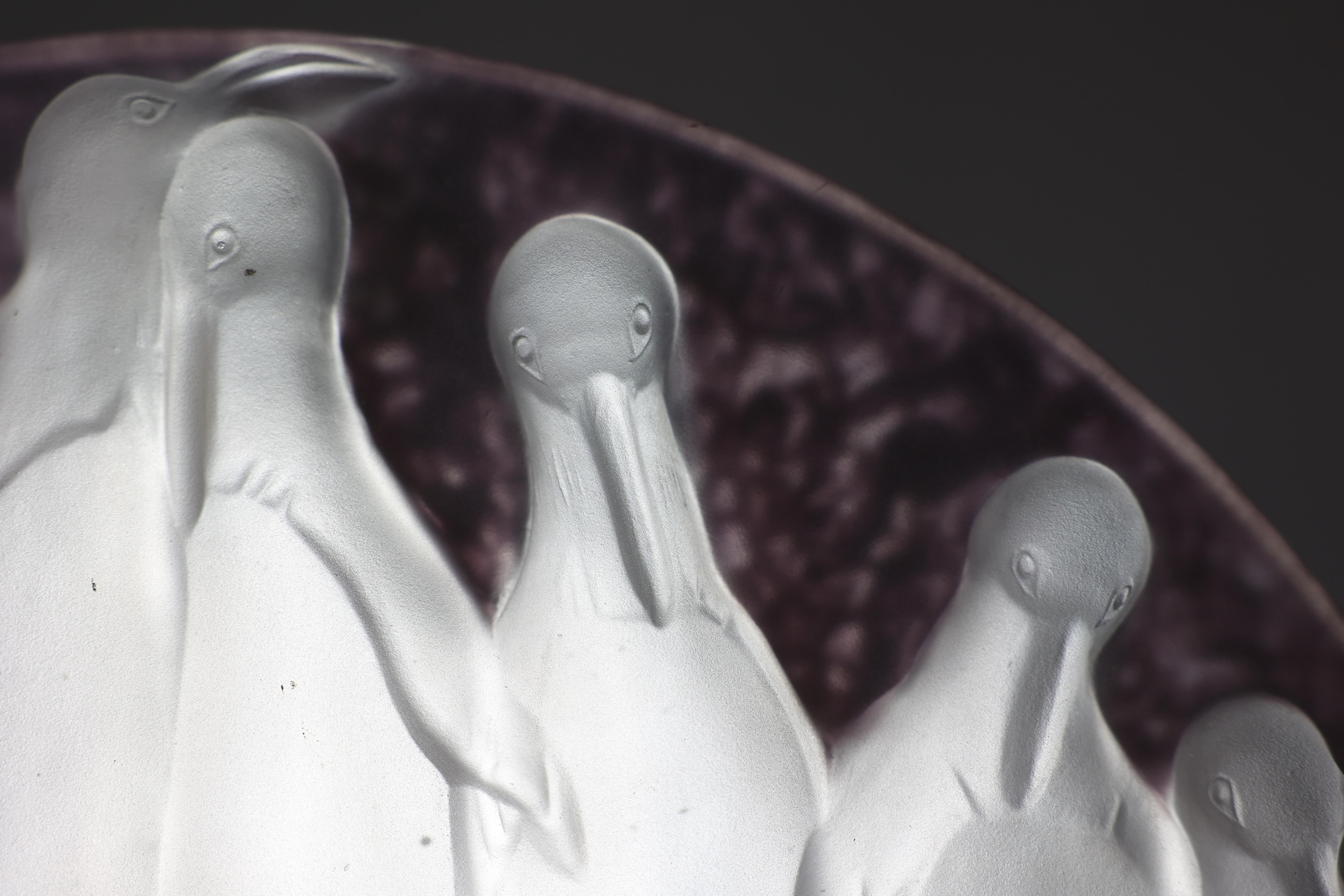 Costebelle. An Art Deco frosted opalescent half-moon glasswork with penguins 2