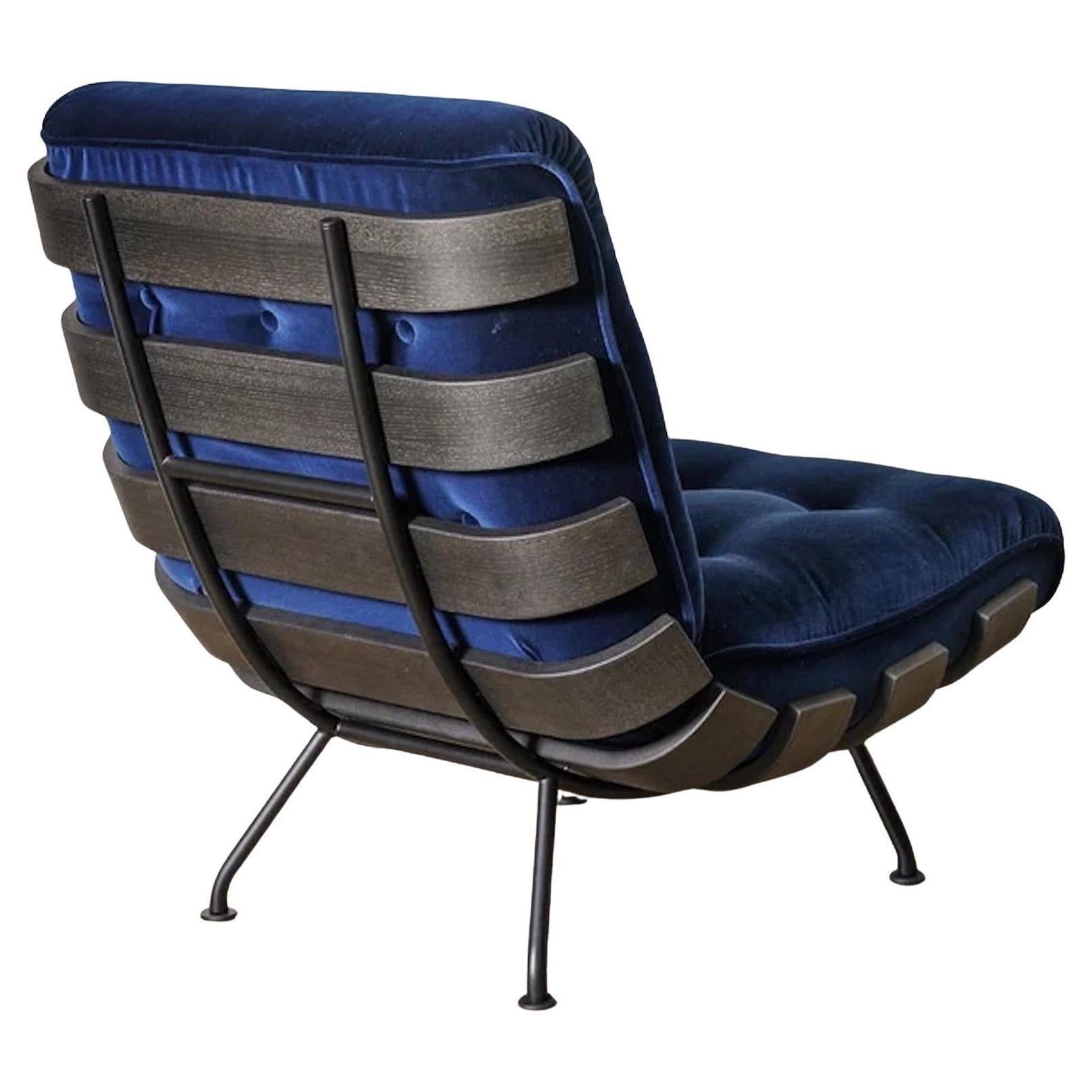 The Costela armchair, designed by Martin Eisler, is a refined expression of timeless elegance and functional art. Its sculptural form, gentle curves, and thoughtful proportions transform seating into an immersive sensory experience, combining visual