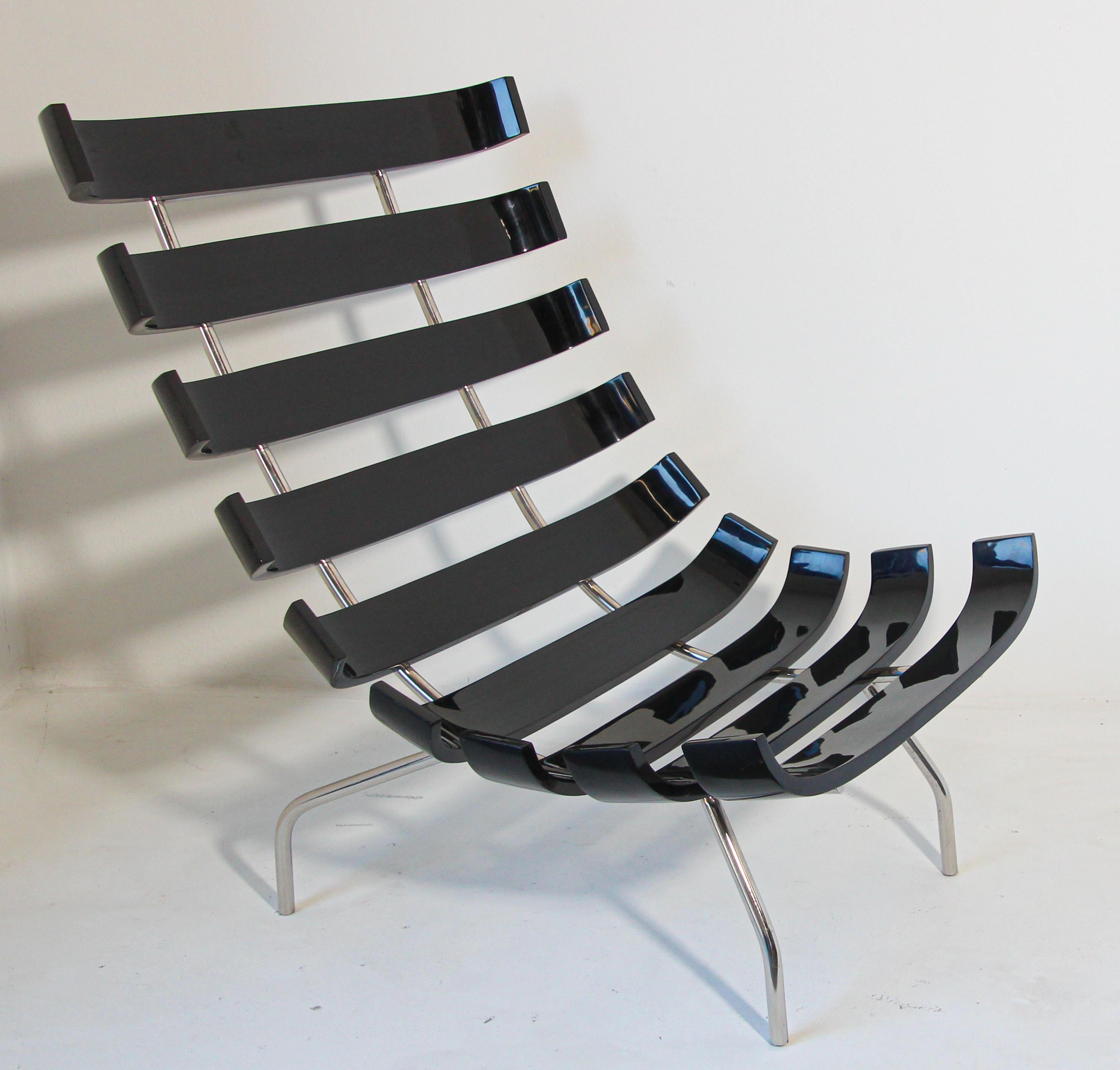 Martin Eisler Carlo Hauner Costela style lounge chair in black lacquer.
Originally designed by Martin Eisler in 1952 this is an icon of Brazilian 1950s design.
Martin Eisler and Carlo Hauner Costela lounge chair, the Costela chair was an important