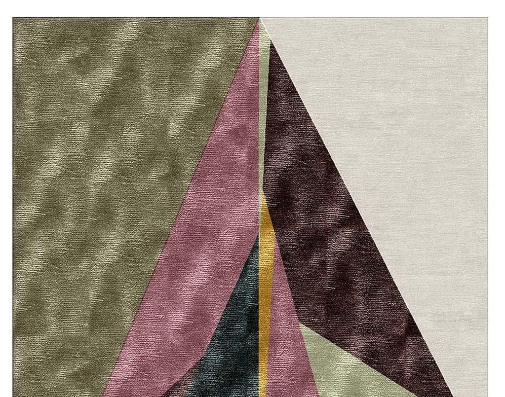 Hand knotted in Nepal by master craftsmen who have been working for Illulian since 1959, this rug is part of the Limited Edition Collection. It was designed by Dimorestudio with a sophisticated combination of geometric shapes in a vegetable- and a