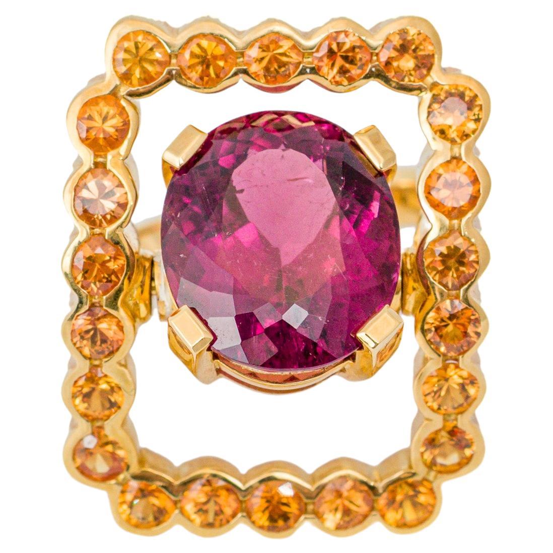 "Costis" Frame In Motion Ring with 9.10 crts Rubellite Tourmaline and Sapphires For Sale