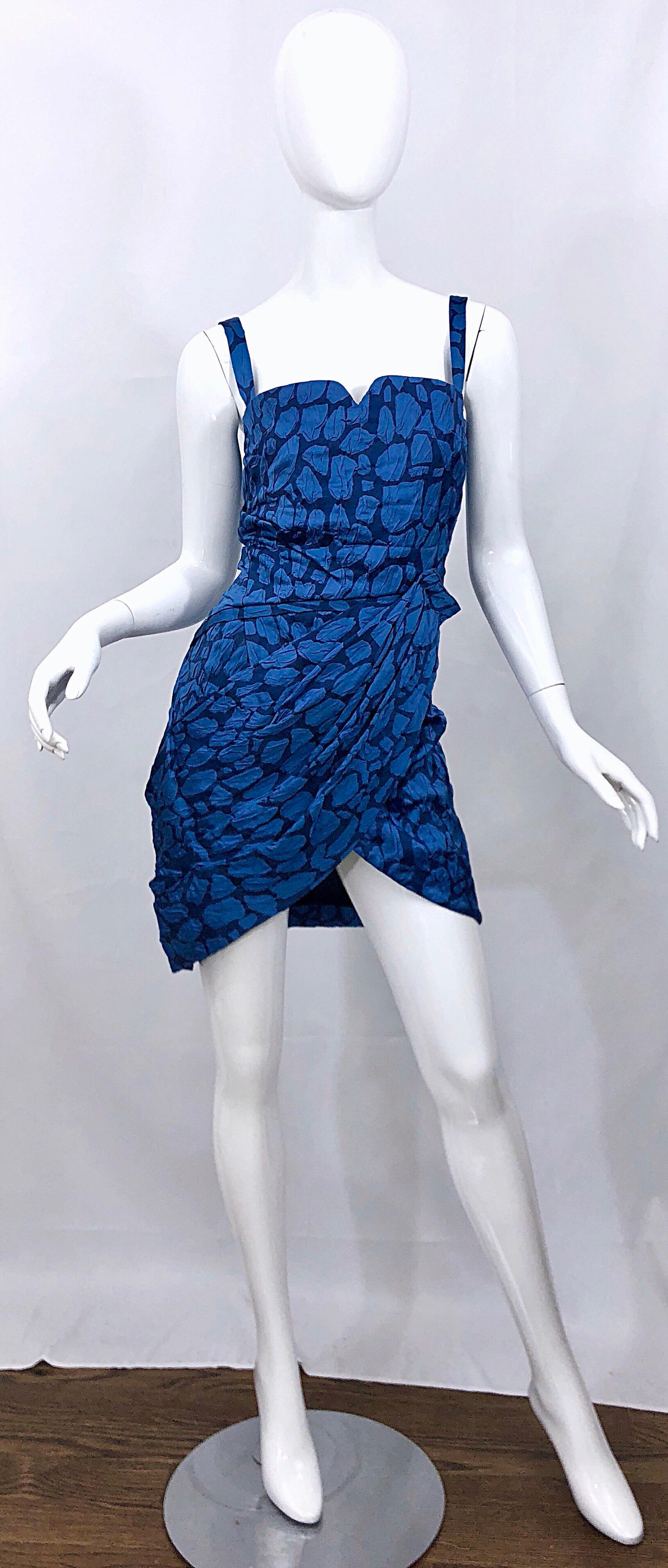 Sexy early 2000s COSTUME NATIONAL blue abstract print asymmetrical sleeveless mini dress! Features a modern take on the sweetheart neckline. So much detail on this Italian masterpiece. Asymmetrical dipped hem with an asymmetrical hidden zipper up