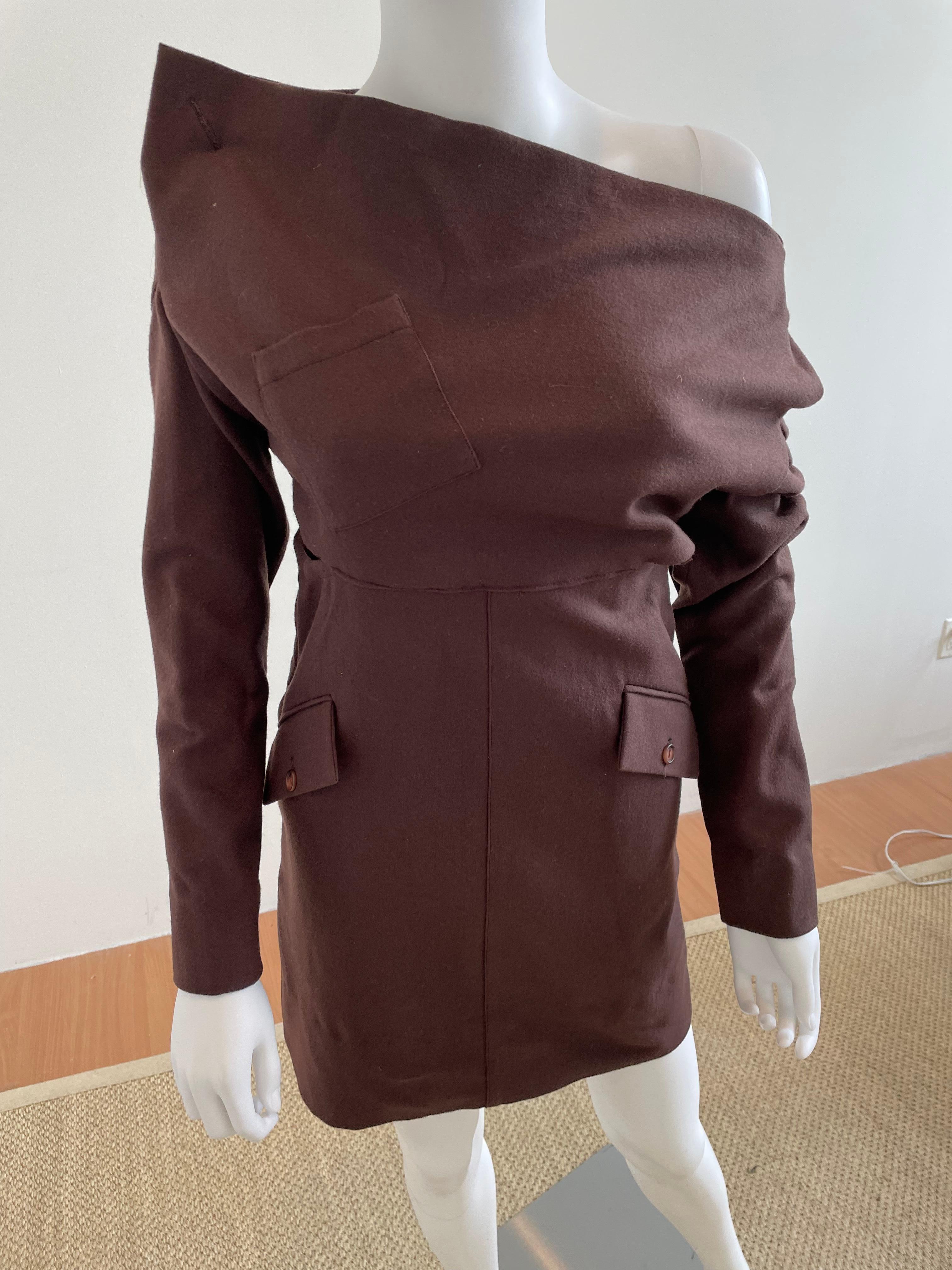 Vintage off shoulder Costume National brown Lana wool mini dress with pockets and a side cut out. Made in Italy. Size Small. Please inquire if you have any questions! Please be mindful that this piece has led a previous life, and may tell its story