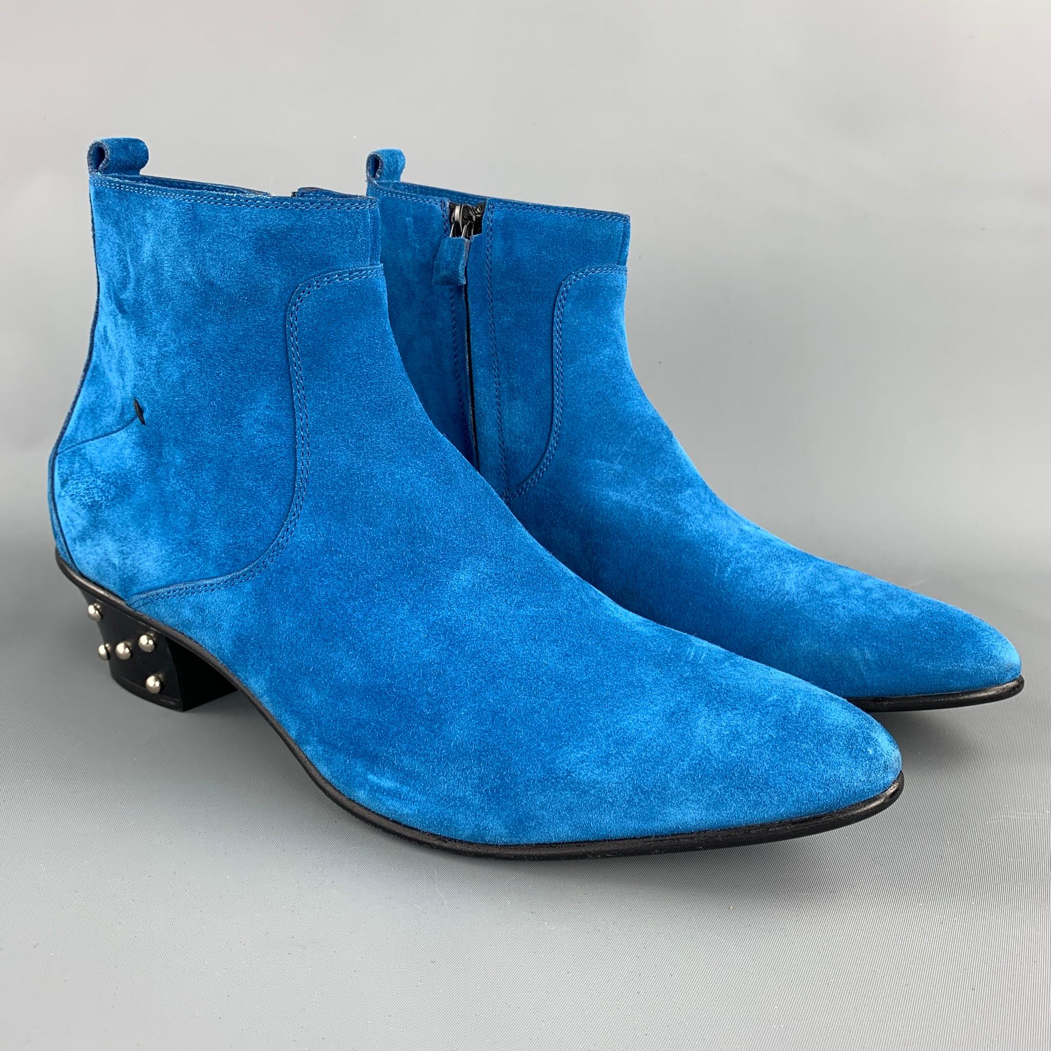 CoSTUME NATIONAL ankle boots comes in a royal blue suede with studded heels featuring a pointed toe, wooden sole, and a side zipper closure. Made in Italy.

New With Tags. 
Marked: 9

Measurements:

Length: 11 in.
Width: 4 in. 
Height: 5 in. 