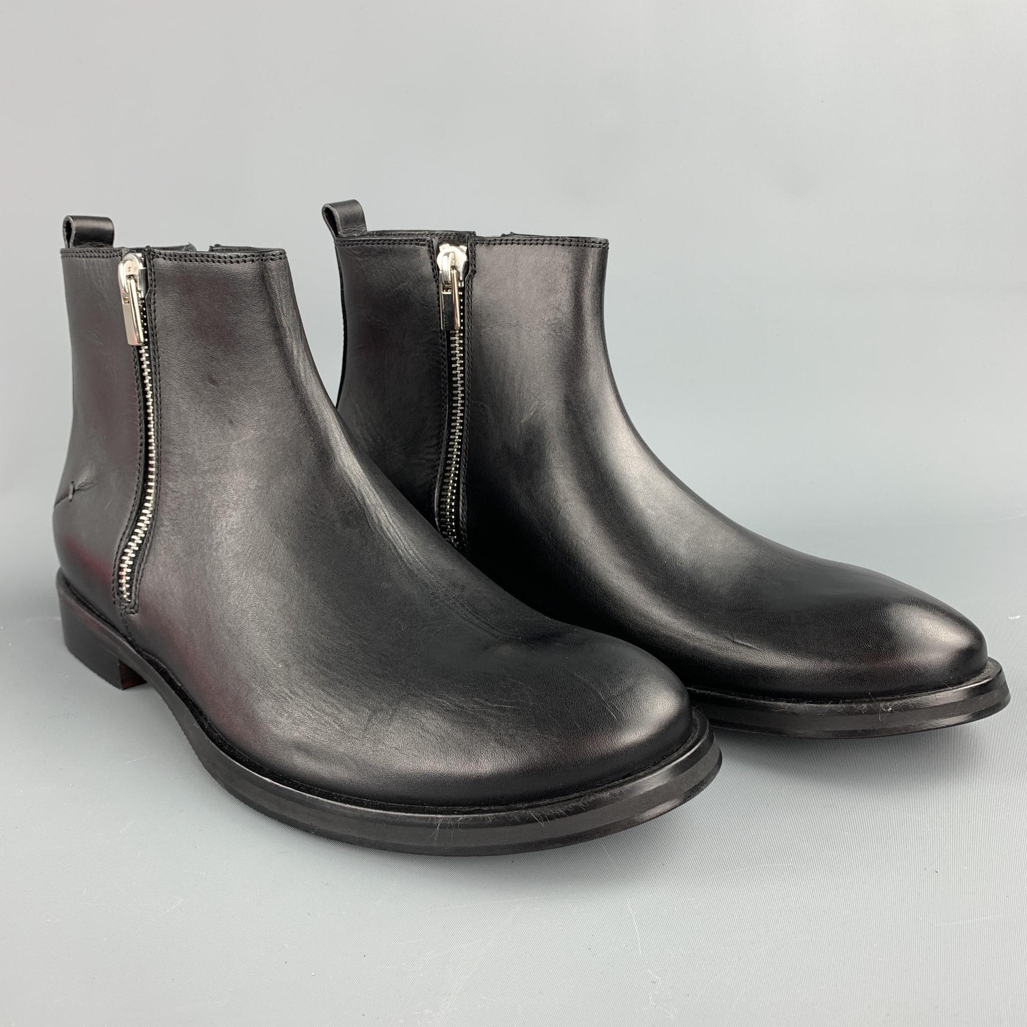 CoSTUME NATIONAL ankle boots comes in a black leather featuring a double zipper closure and a wood grain sole. Made in Italy. 

Brand New. 
Marked:

Measurements:

Length: 12.5 in. 
Width: 4.5 in. 
Height: 6.5 in. 
