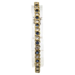 Bracelet Costume ligne tennis en or avec saphirs et diamants