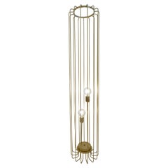 Cosulich Interiors Lampada da terra aperta minimalista italiana futurista in acciaio dorato