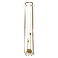 Cosulich Interiors Lampada da terra aperta minimalista italiana futurista in acciaio dorato