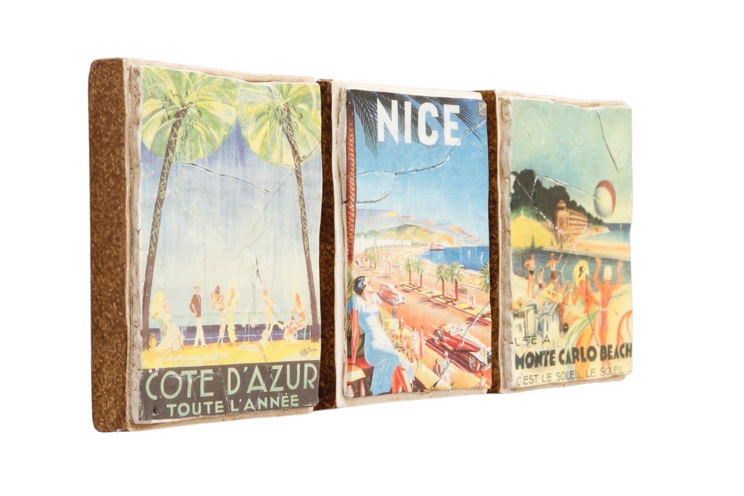 A set of three original gypsum art blocks by Sarasota artist Sean Coleman (b.1965). Described as “arrangeable art” the three blocks each feature a different Art Deco French travel poster designed by “Eff D'Hey” commissioned by the French government