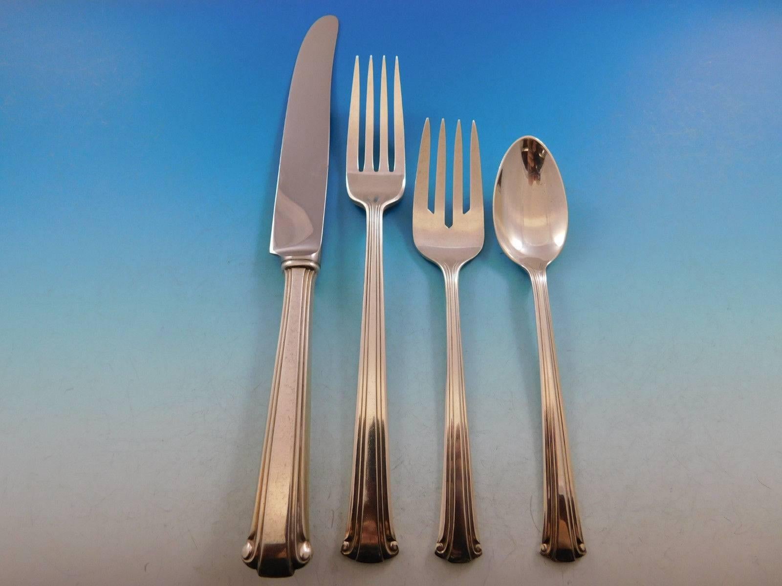 Dinner size cotillion by Reed & Barton sterling silver flatware set - 48 pieces. This set includes:

Eight dinner size knives, 9 5/8
