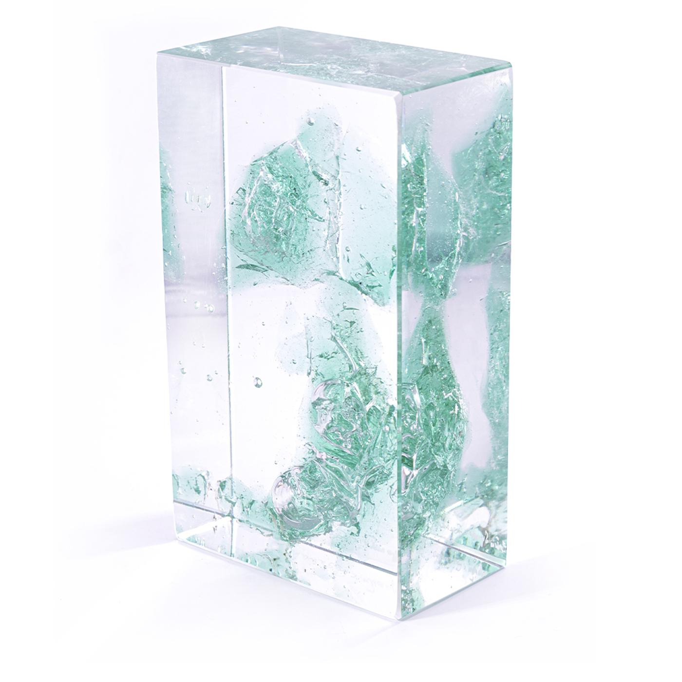 Cotisso Totem is a Murano glass block, pure and monochromatic, obtained by breaking the crucible at the end of the process of manufacturing the glass of a particular color. It is a handcrafted unique piece, part of the Casarialto Atelier project.