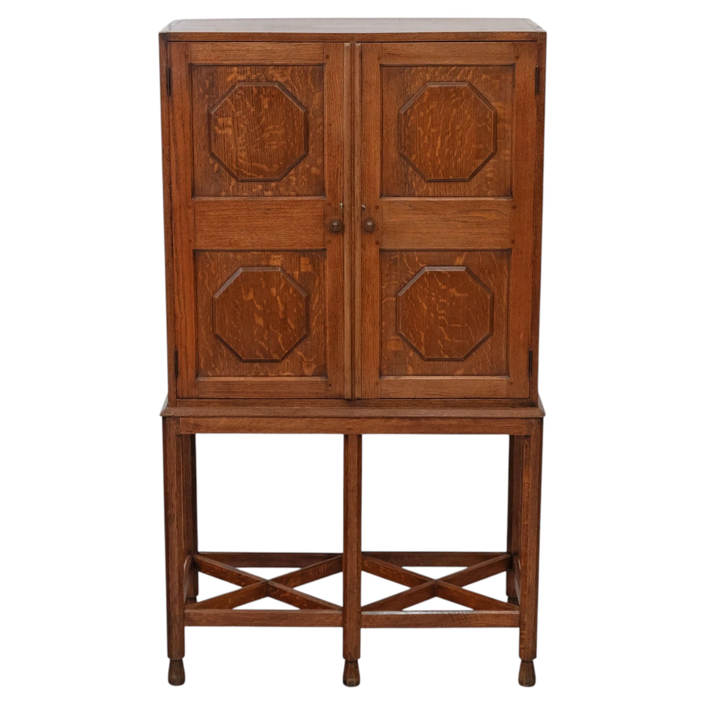 Cotswold School Oak Cabinet On Stand Circa 1920's