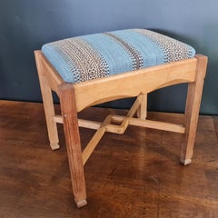 Cotswolds School oak upholstered stool