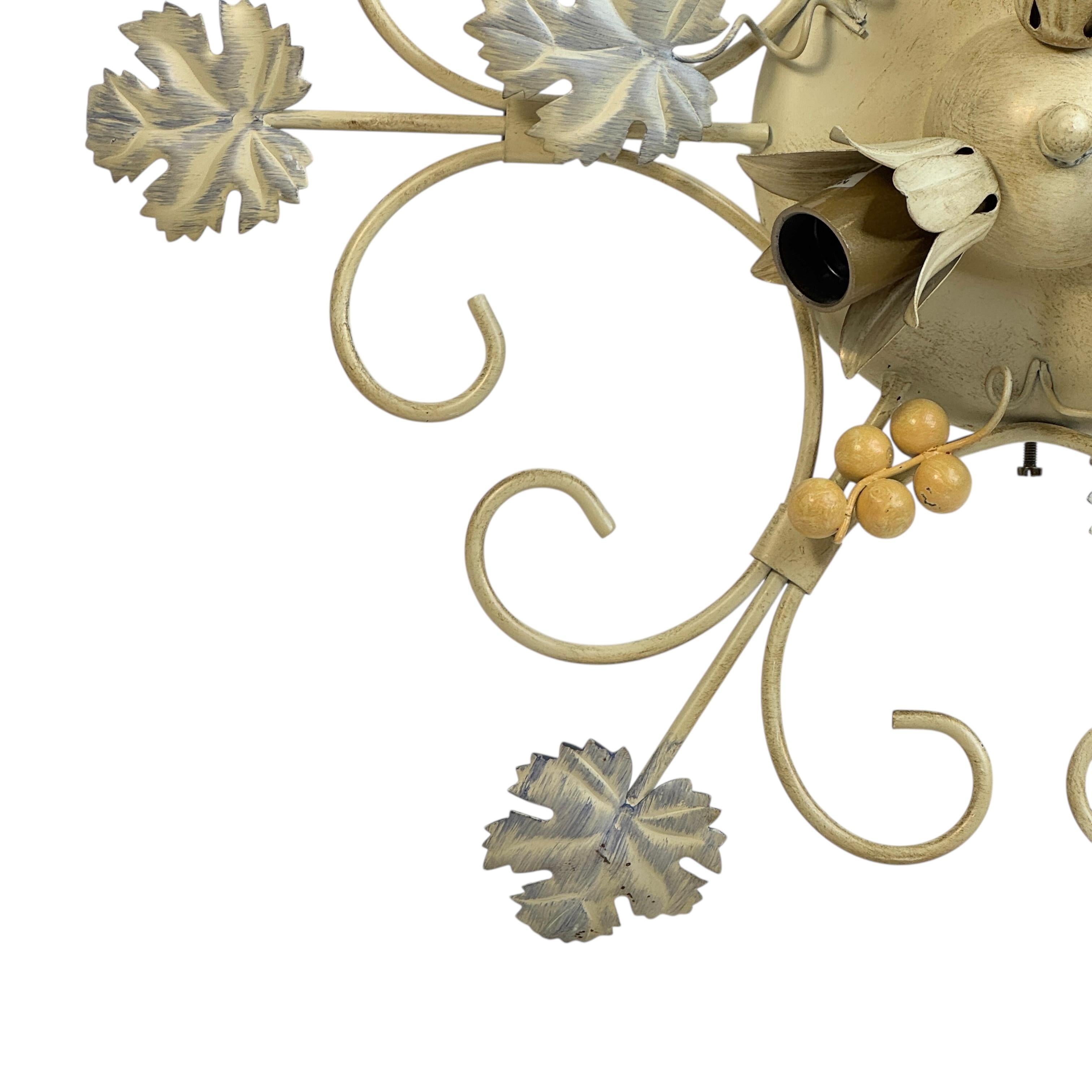 Petite Florentine style three-light flush mount chandelier. The Fixture requires three European E14 / 110 Volt Candelabra bulbs, each bulb up to 40 watts. Beautiful colored metal flush mount with grape and leaf design. Made by Kolarz Leuchten in