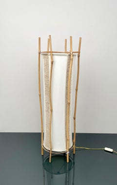 Lampada da terra in cotone, bambù e rattan attribuita a Louis Sognot, Francia anni '60
