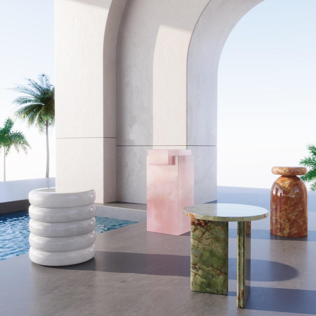 A handcrafted masterwork, the Cotton Candy Onyx End Table features rising rings of coloured marble. All of the stones utilised in this artwork are indigenous to Mexico, giving it a special feeling of place and history.

The creative blending of
