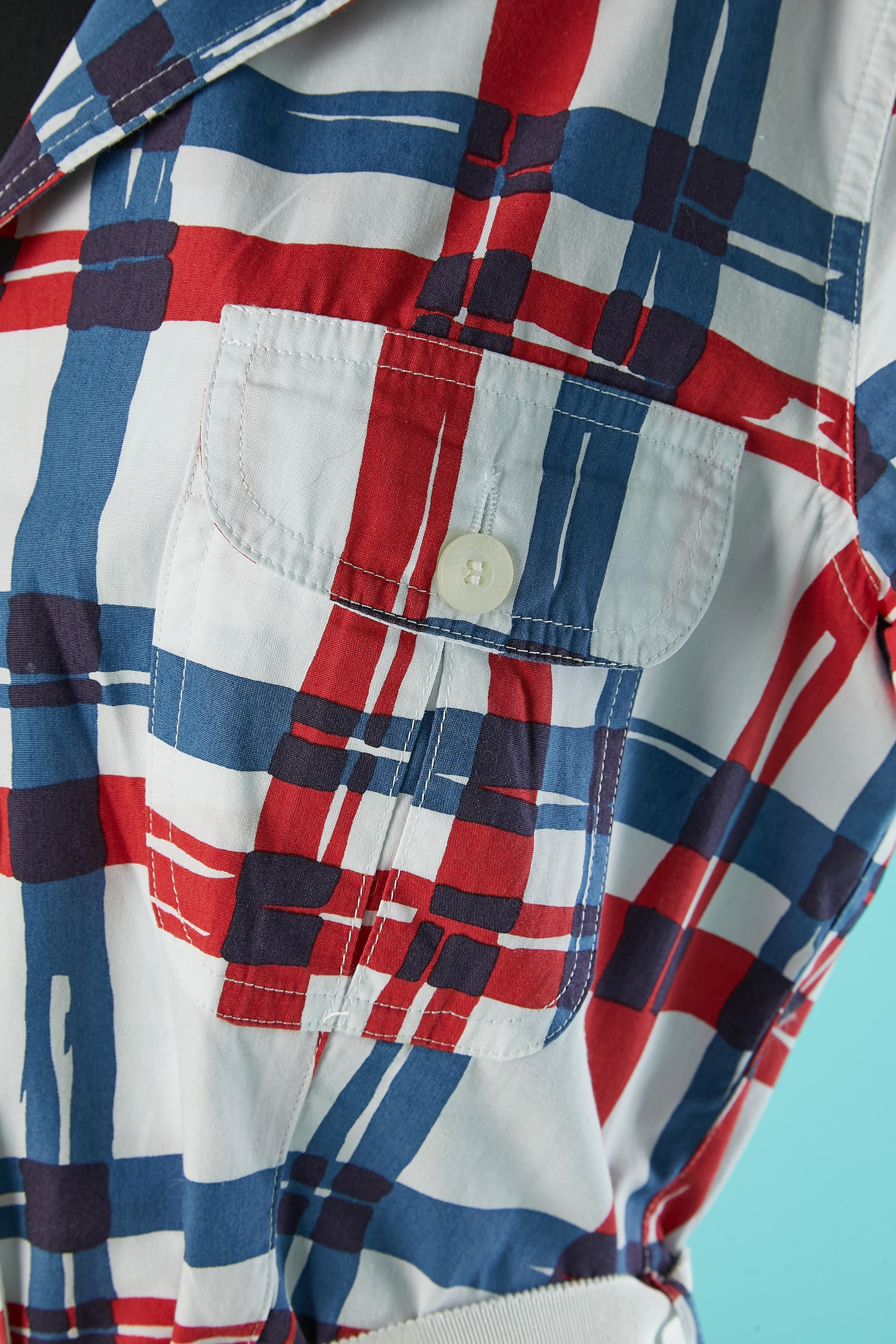 Cotton chemise dress with check pattern. Gros-grain belt. Pocket on both side. 
Branded button closure and buttonhole on the middle front and on the breast pocket. 
SIZE 42 (It) 38 (Fr) M 