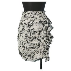 Falda drapeada de algodón con volante y estampado en blanco y negro ALEXANDRE VAUTHIER