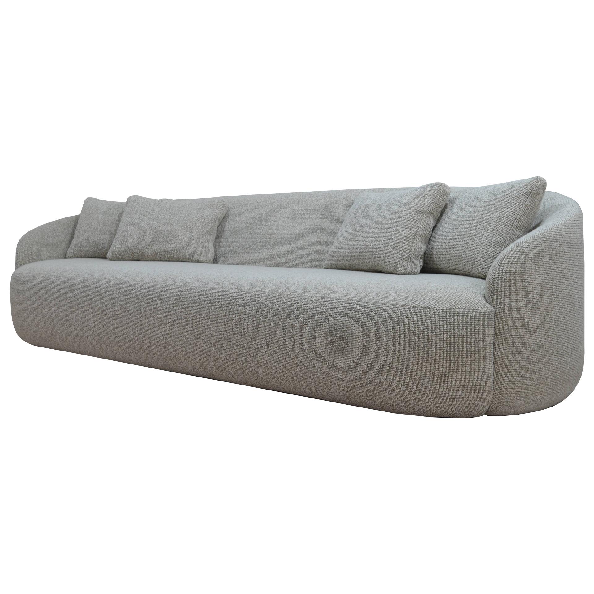 The rounded, curved shape, is crafted into the unique and original design of this well-proportioned and visually distinctive sofa series, available in custom sizes, ensuring intimacy and convivial socialization in any interior. Upholstery in your