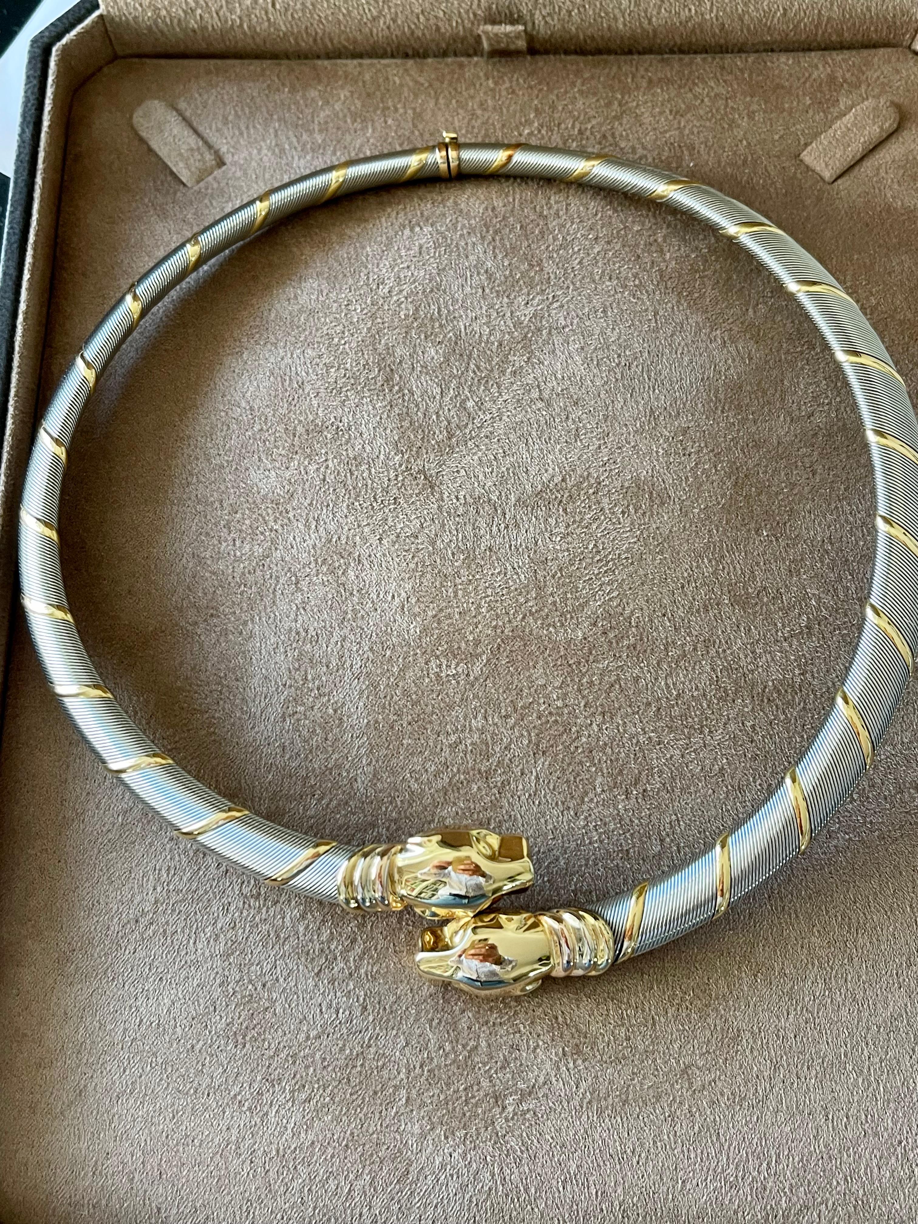 A wonderful Vintage Cartier 18 K Gold Cougar Panthere Necklace, sumptuously hand-made in Cartier's Parisian workshop in the late 1990s. This piece features three colours of 750 (18 K) yellow, white and rose gold wire, wrapped around a gold solenoid,