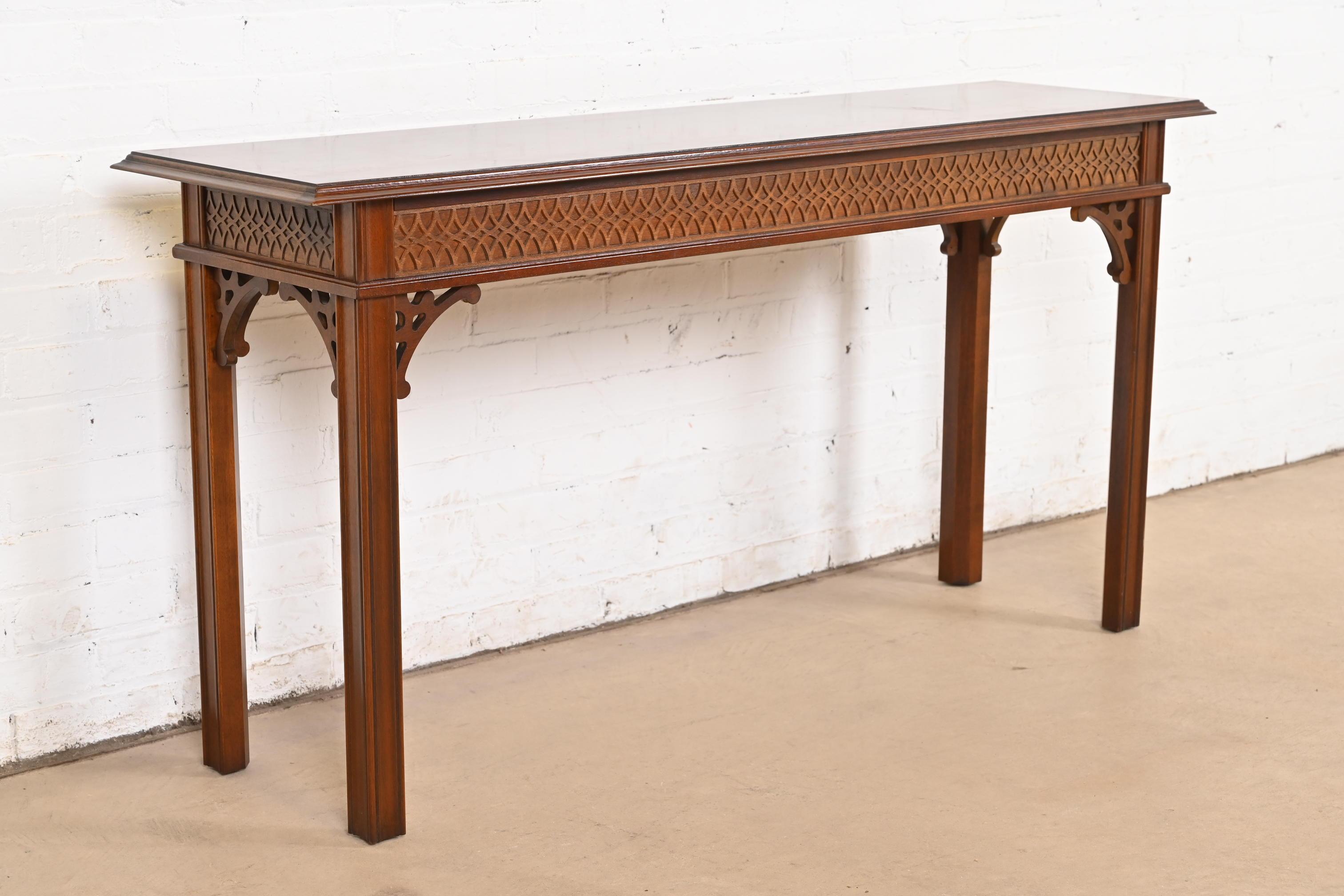 A gorgeous Georgian or Chippendale style buffet server, sofa table, or console table

By Councill Craftsmen

USA, Circa 1980s

Carved mahogany, with banded mahogany top.

Measures: 54