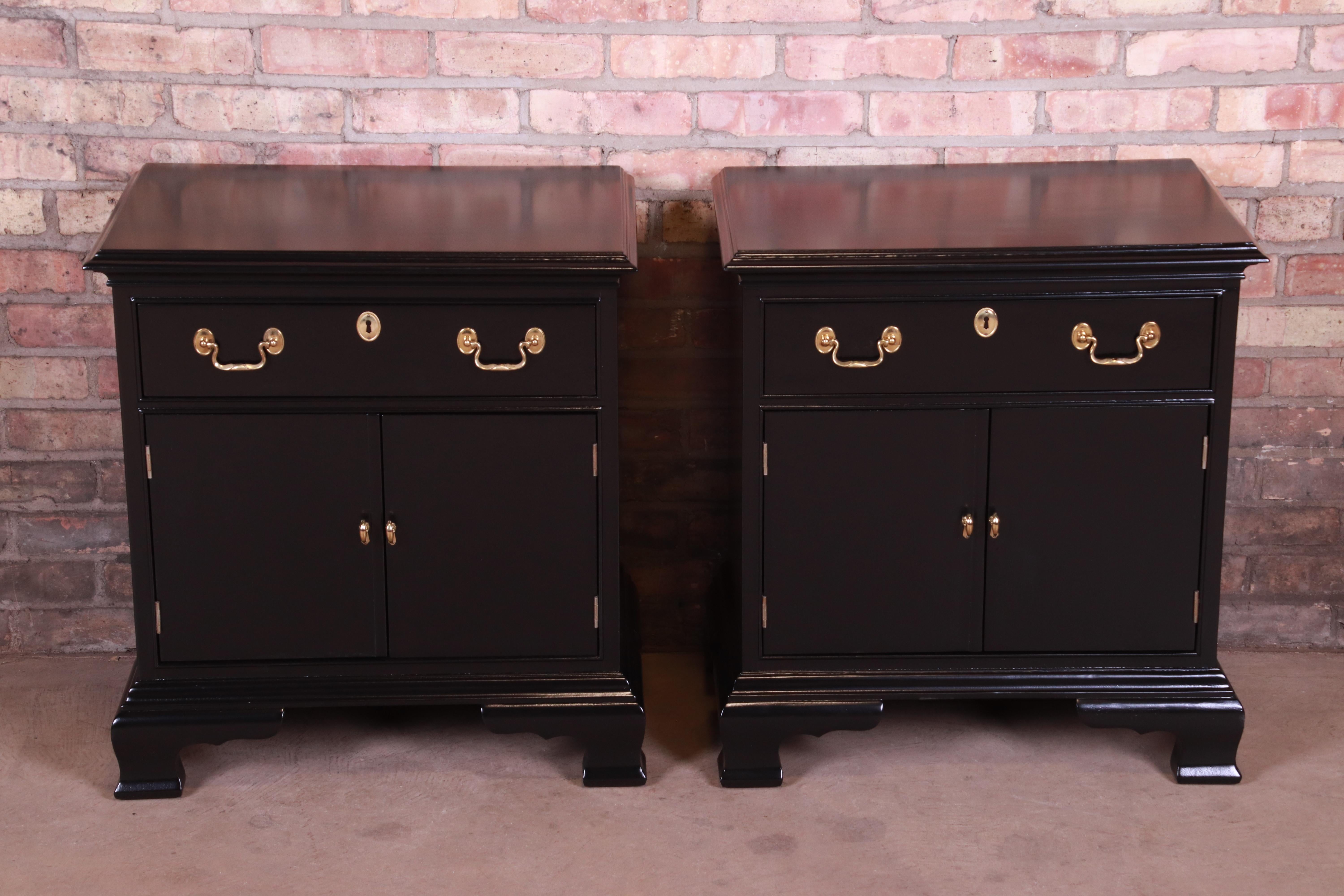 A gorgeous pair of end tables or nightstands

By Councill Craftsmen Furniture

USA, circa 1980s

Black lacquered mahogany, with original brass hardware.

Measures: 24