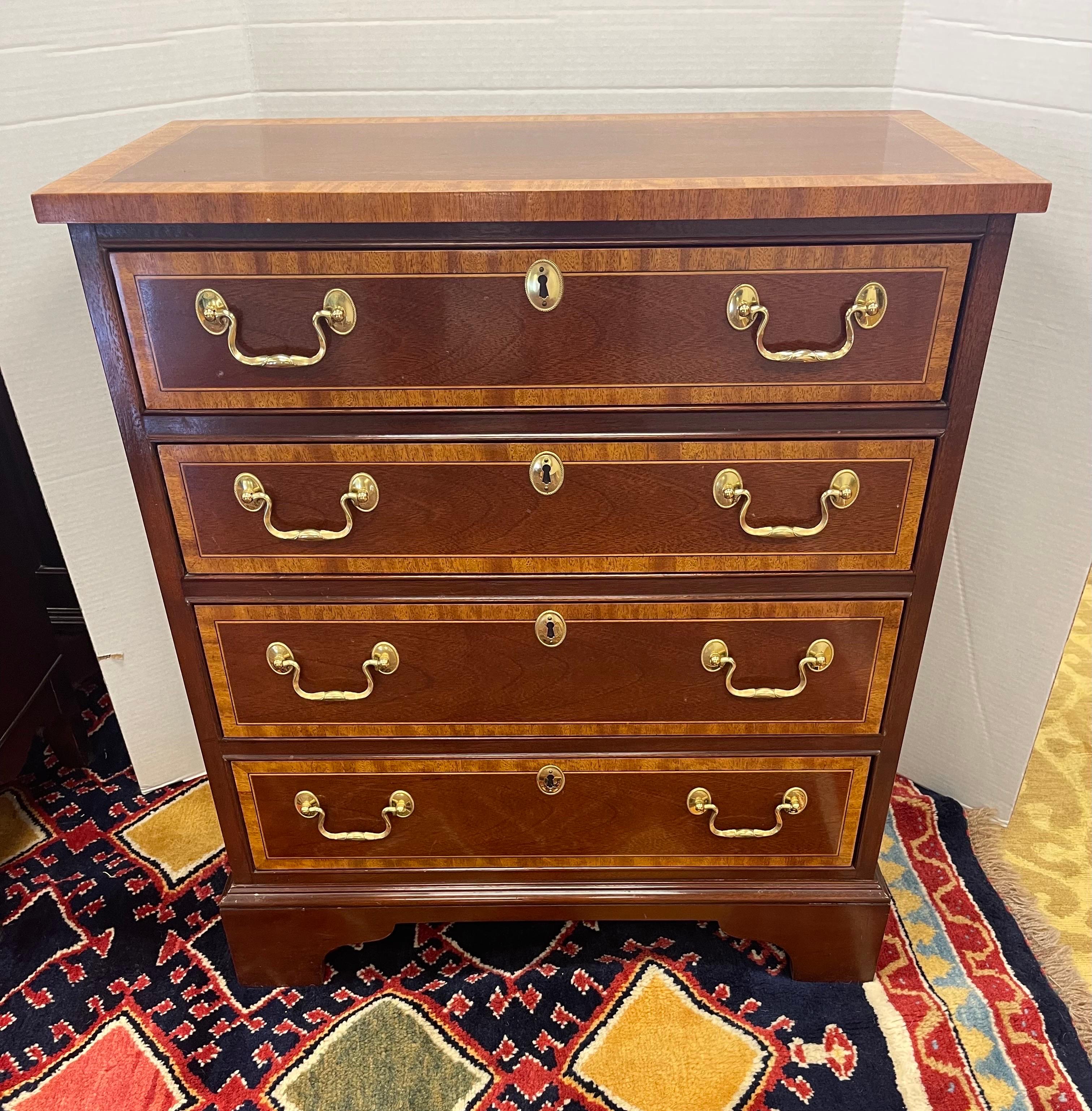 Elegant signed Councill Furniture, made in USA, federal bachelors' chest.
Gorgeous inlay mahogany throughout. Four drawers in total. Why not own the good stuff?