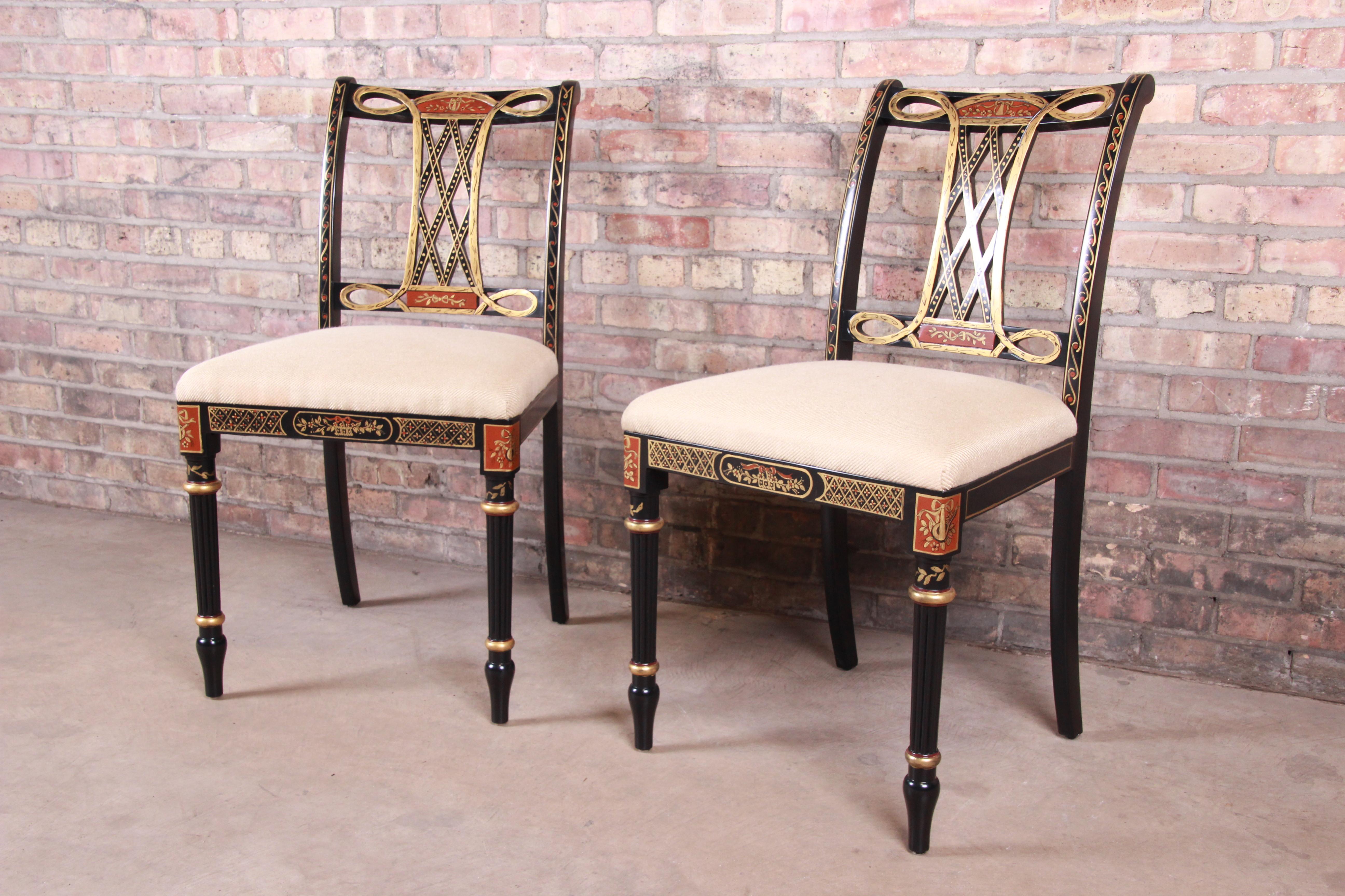 A gorgeous pair of Regency style side chairs

By Councill Furniture

USA, circa 1990s

Ebonized and hand painted wood frames, with upholstered seats.

Measures: 19.75